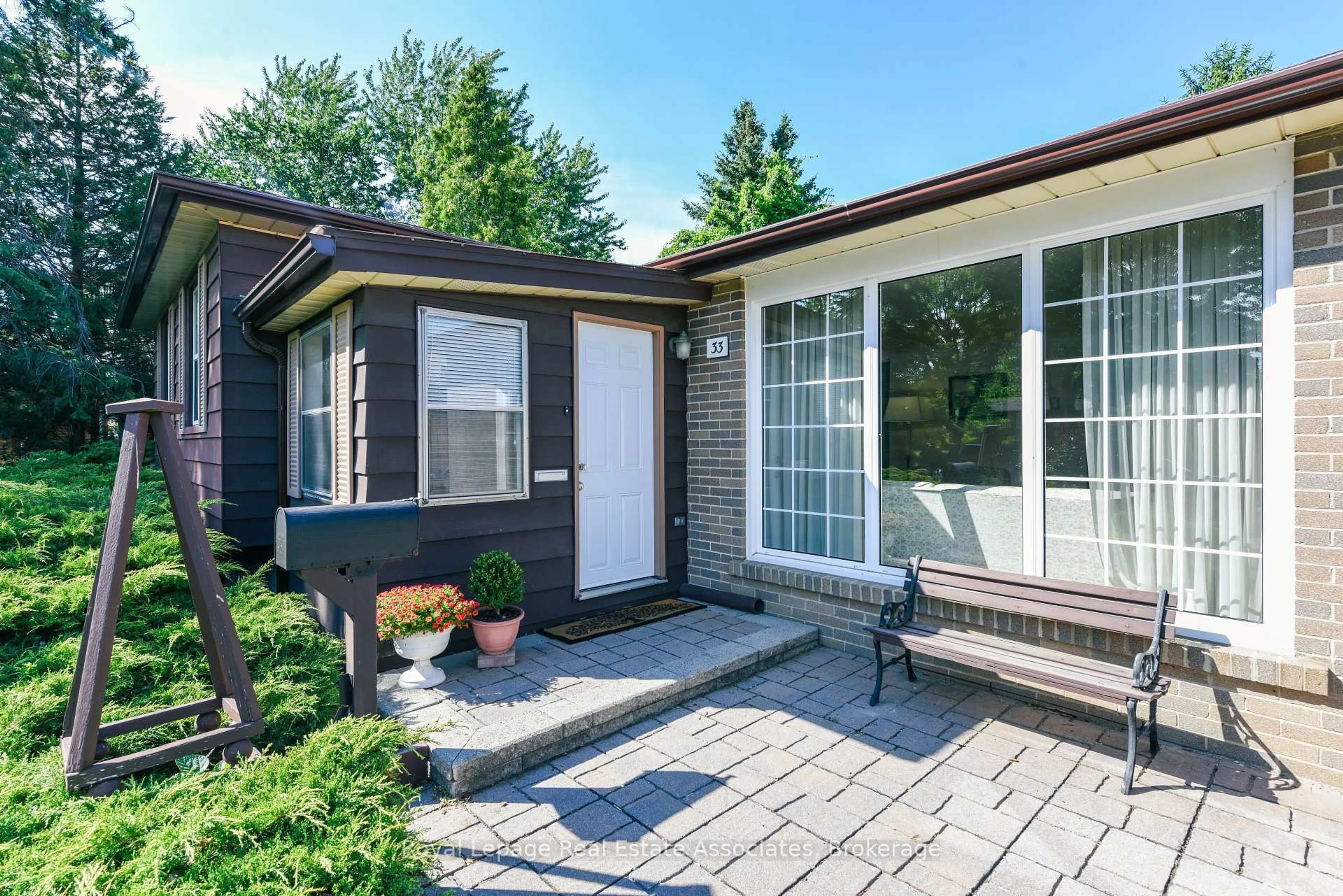 Home with brick exterior material, street for 33 Deloraine Dr, Brampton Ontario L6T 1T6