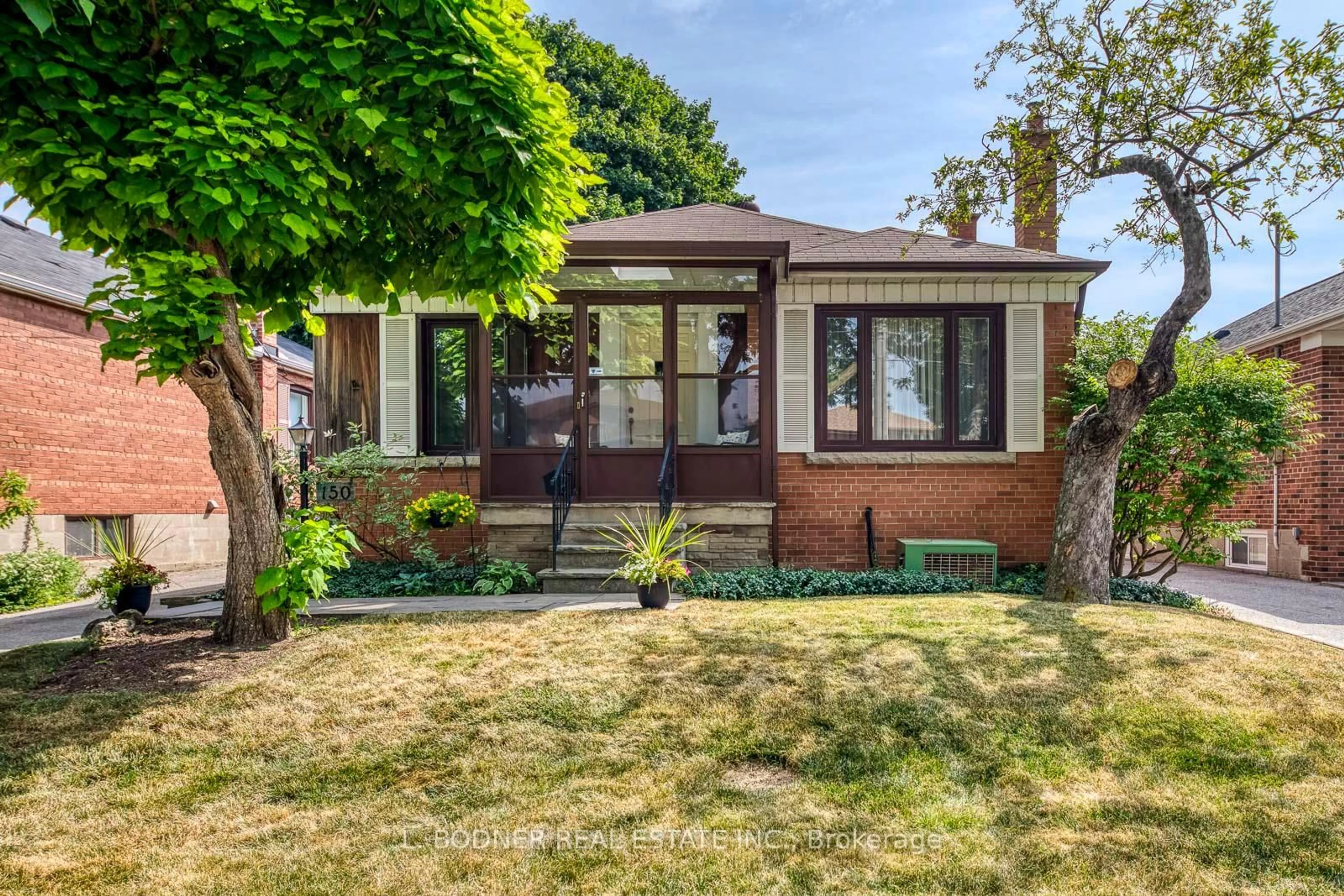Home with brick exterior material, street for 150 Silverhill Dr, Toronto Ontario M9B 3W7
