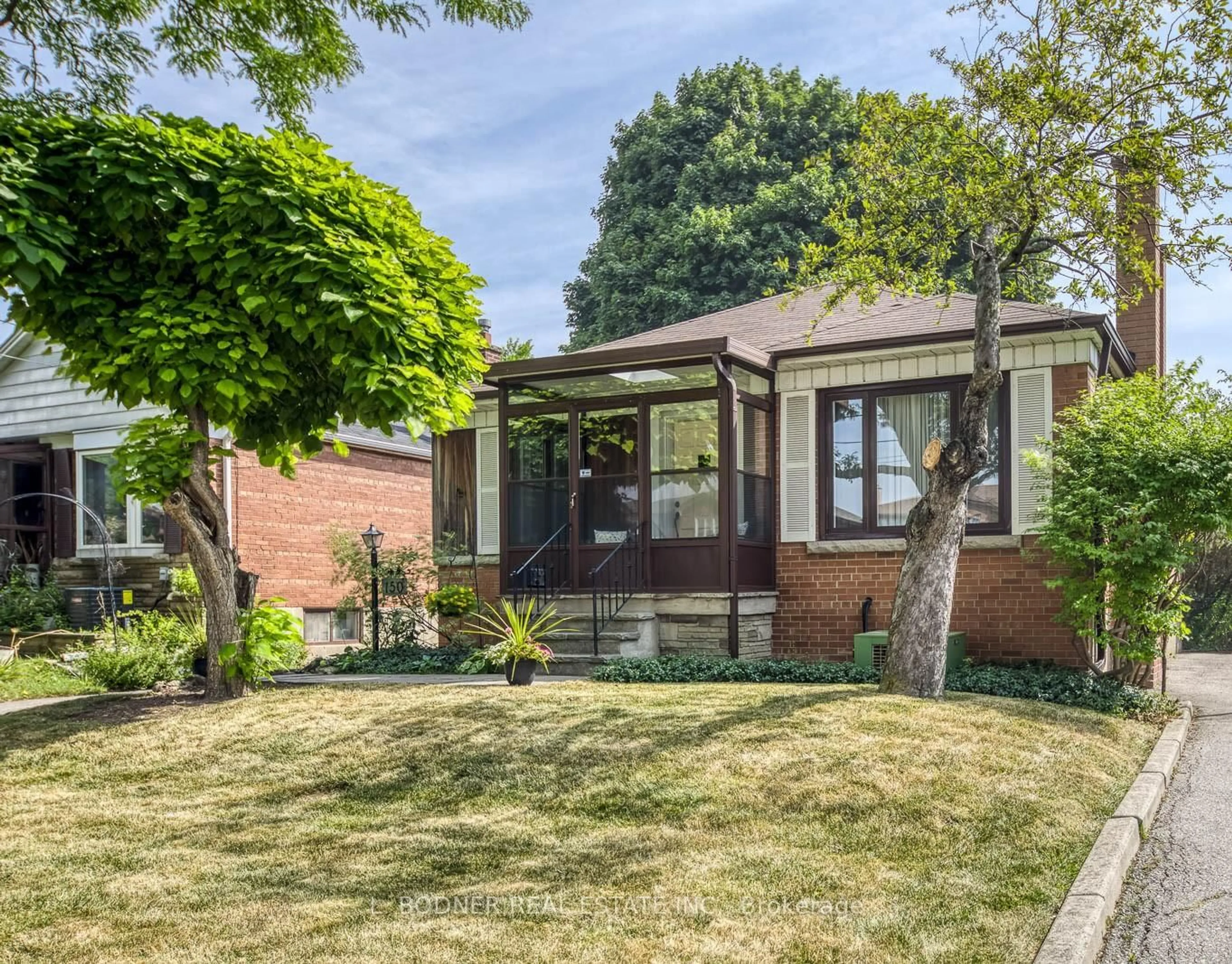 Home with brick exterior material, street for 150 Silverhill Dr, Toronto Ontario M9B 3W7