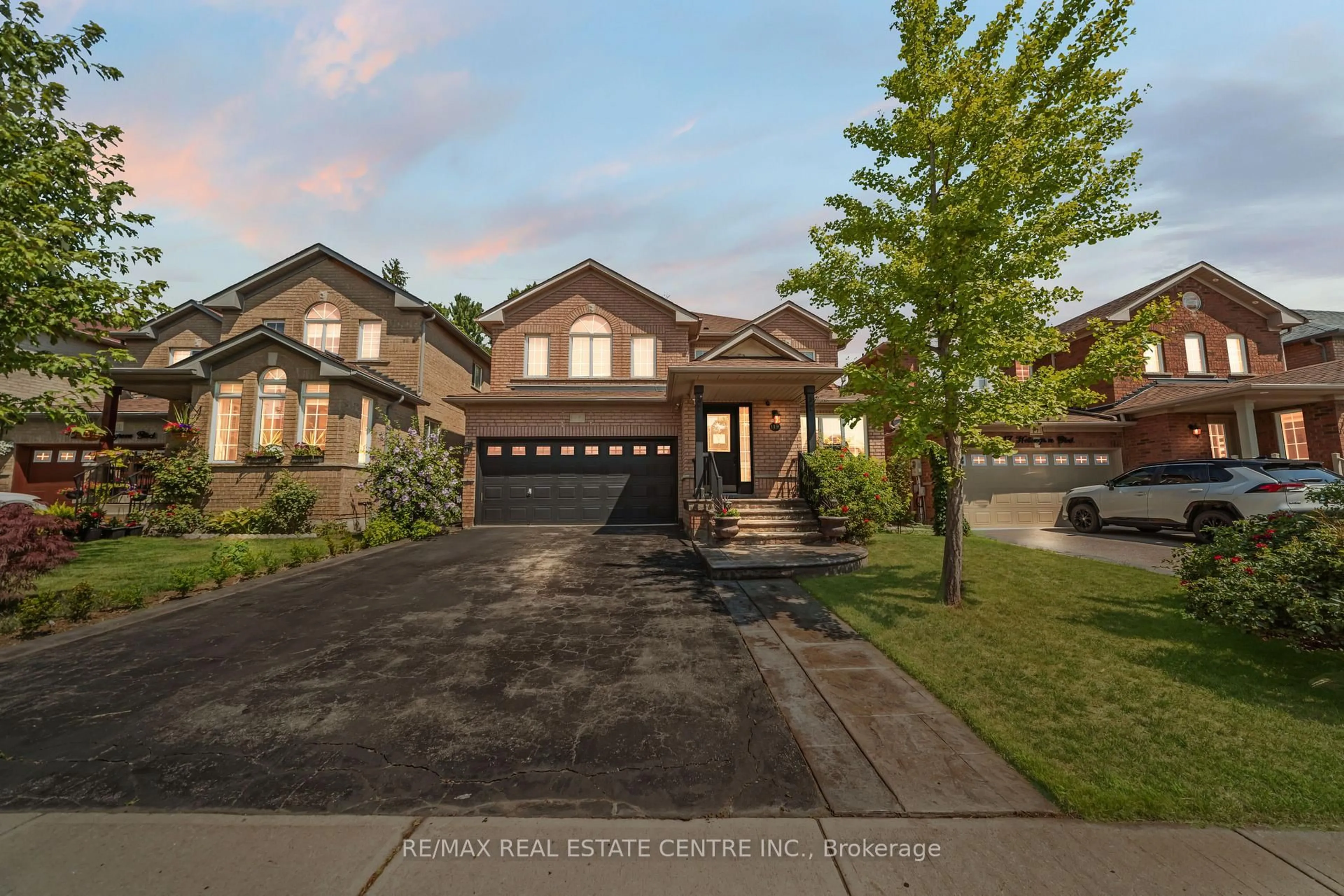 Home with brick exterior material, street for 19 Hollowgrove Blvd, Brampton Ontario L6P 1B1
