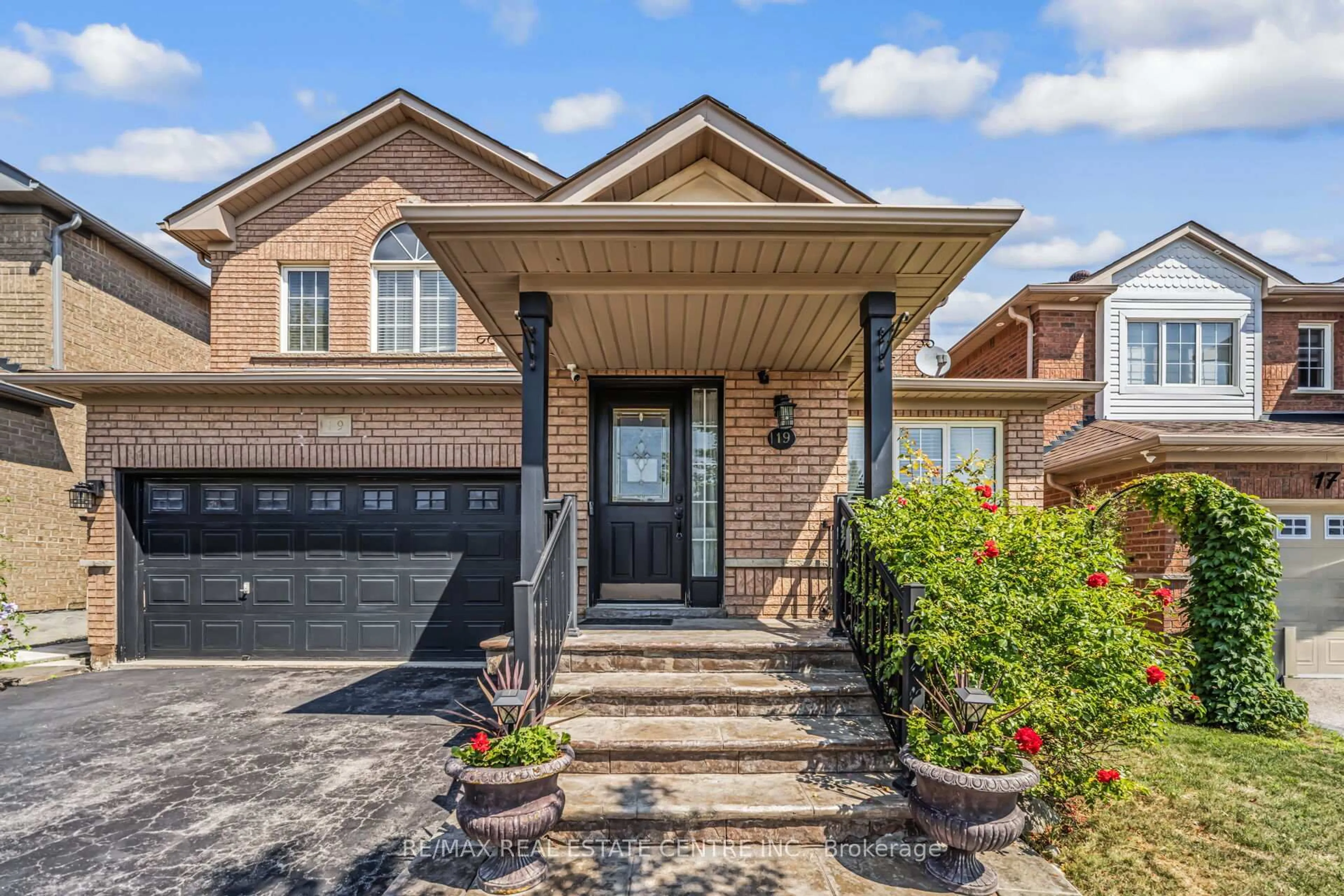 Home with brick exterior material, street for 19 Hollowgrove Blvd, Brampton Ontario L6P 1B1