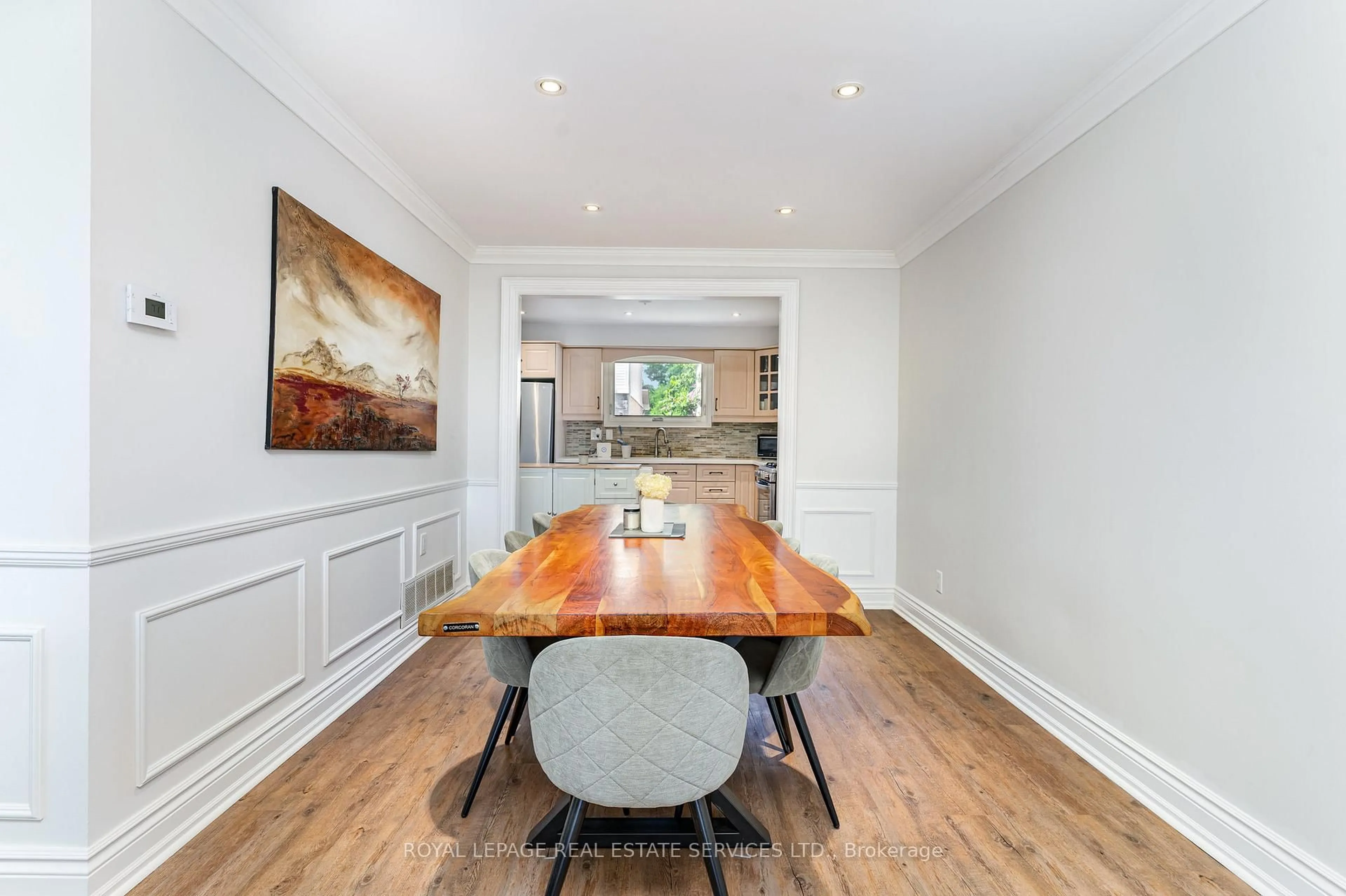 Dining room, wood/laminate floor for 47 Lafferty St, Toronto Ontario M9C 5B5