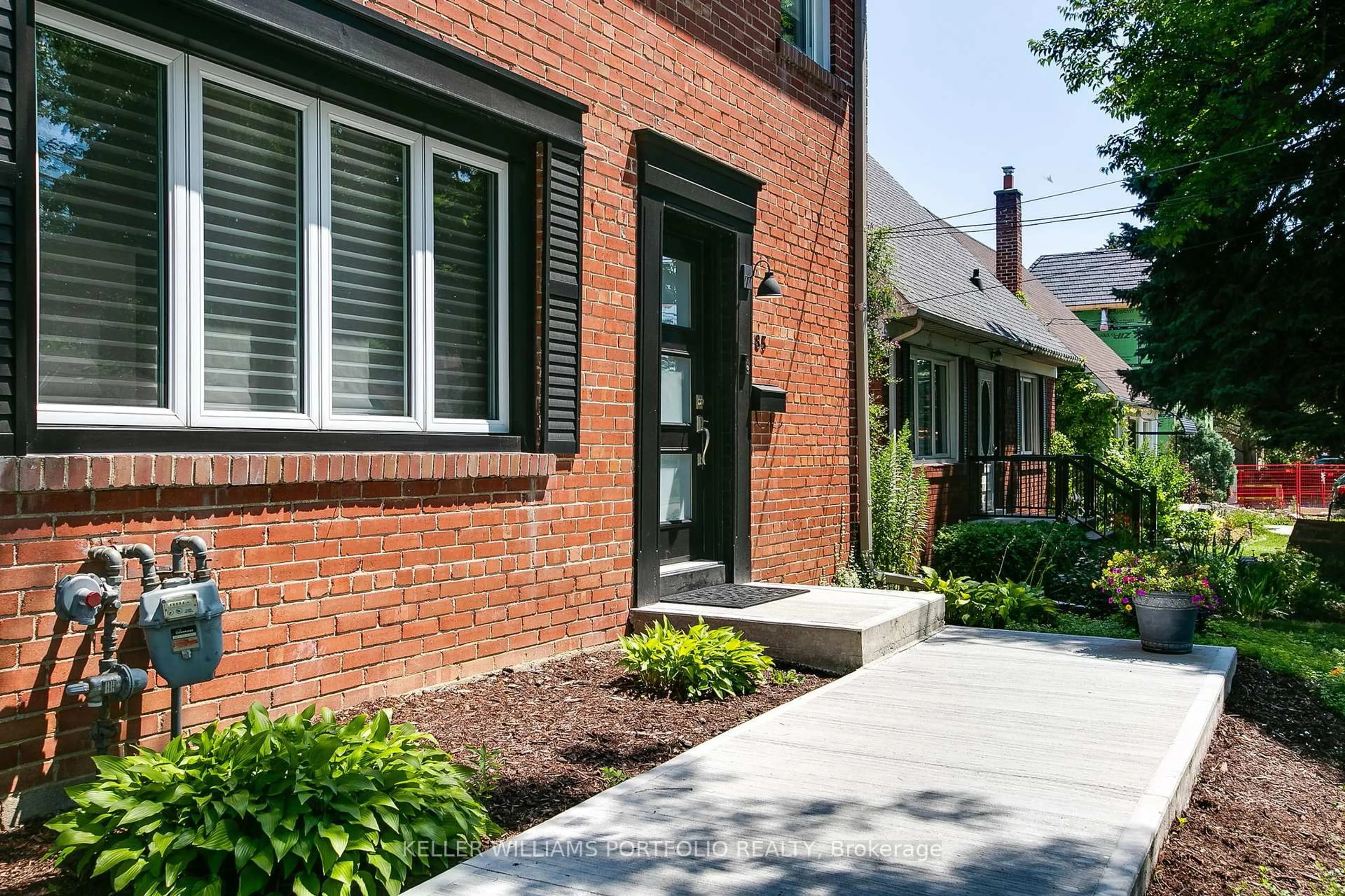Home with brick exterior material, street for 85 Ashbourne Dr, Toronto Ontario M9B 4H6