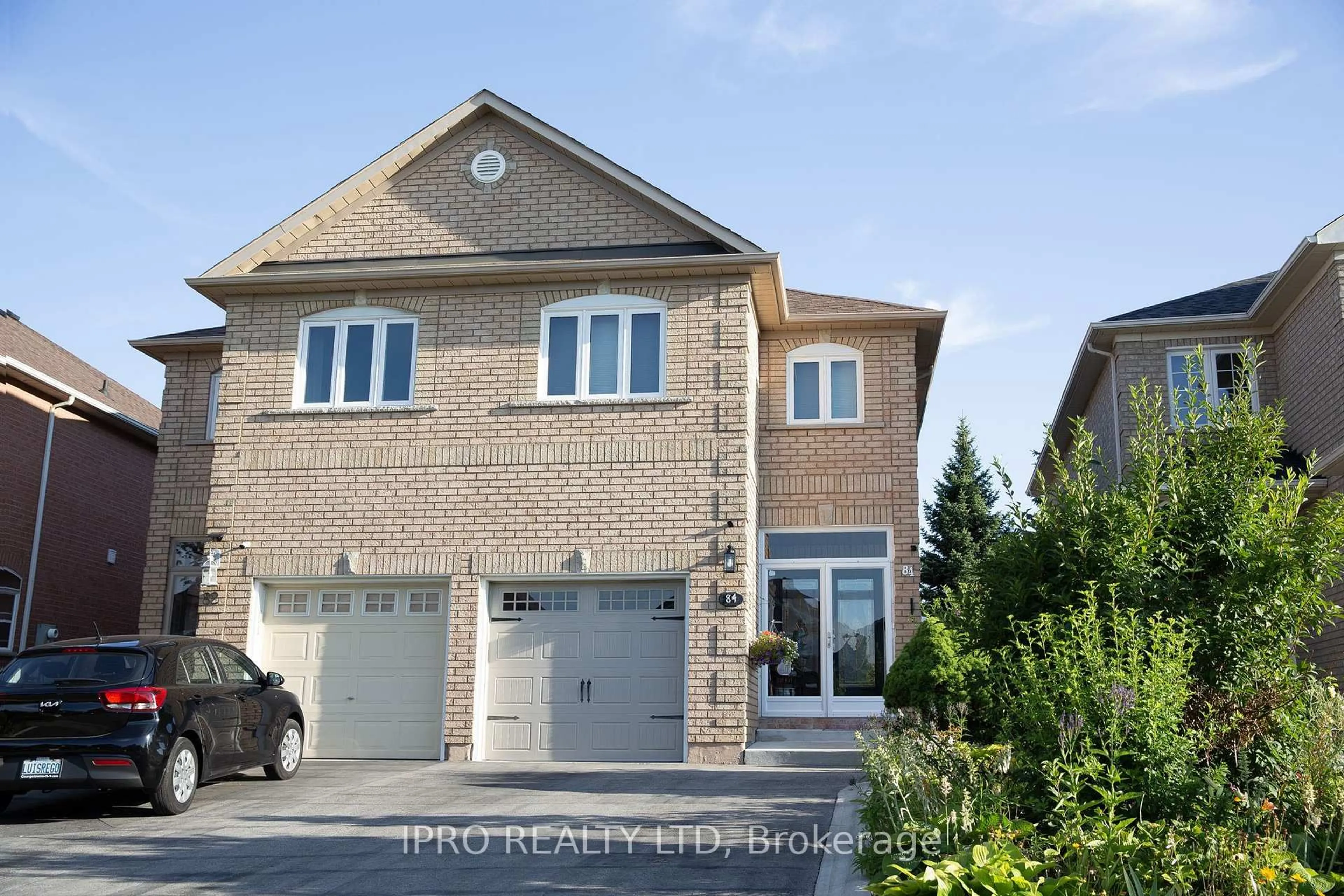 Home with brick exterior material, street for 84 Weather Vane Lane, Brampton Ontario L6X 4R4
