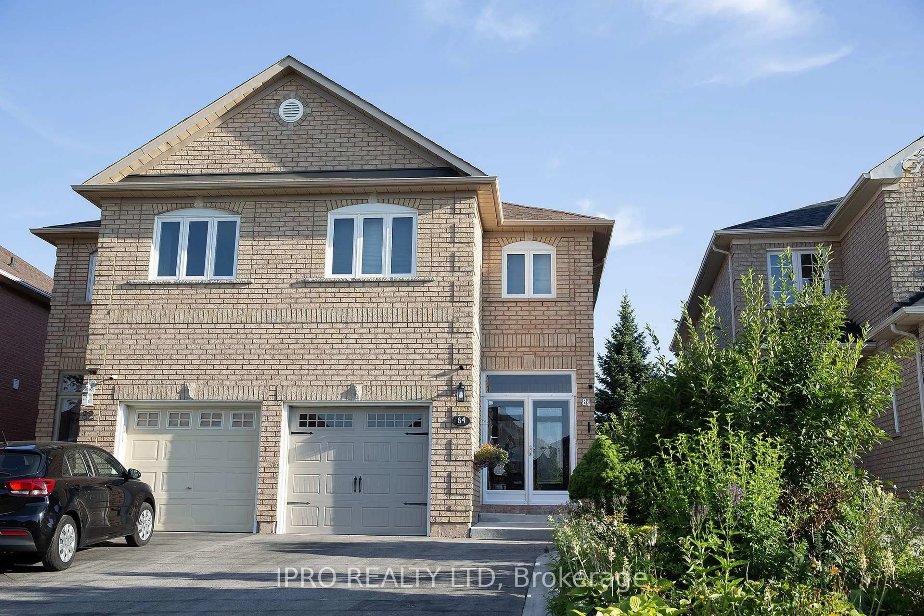Home with brick exterior material, street for 84 Weather Vane Lane, Brampton Ontario L6X 4R4