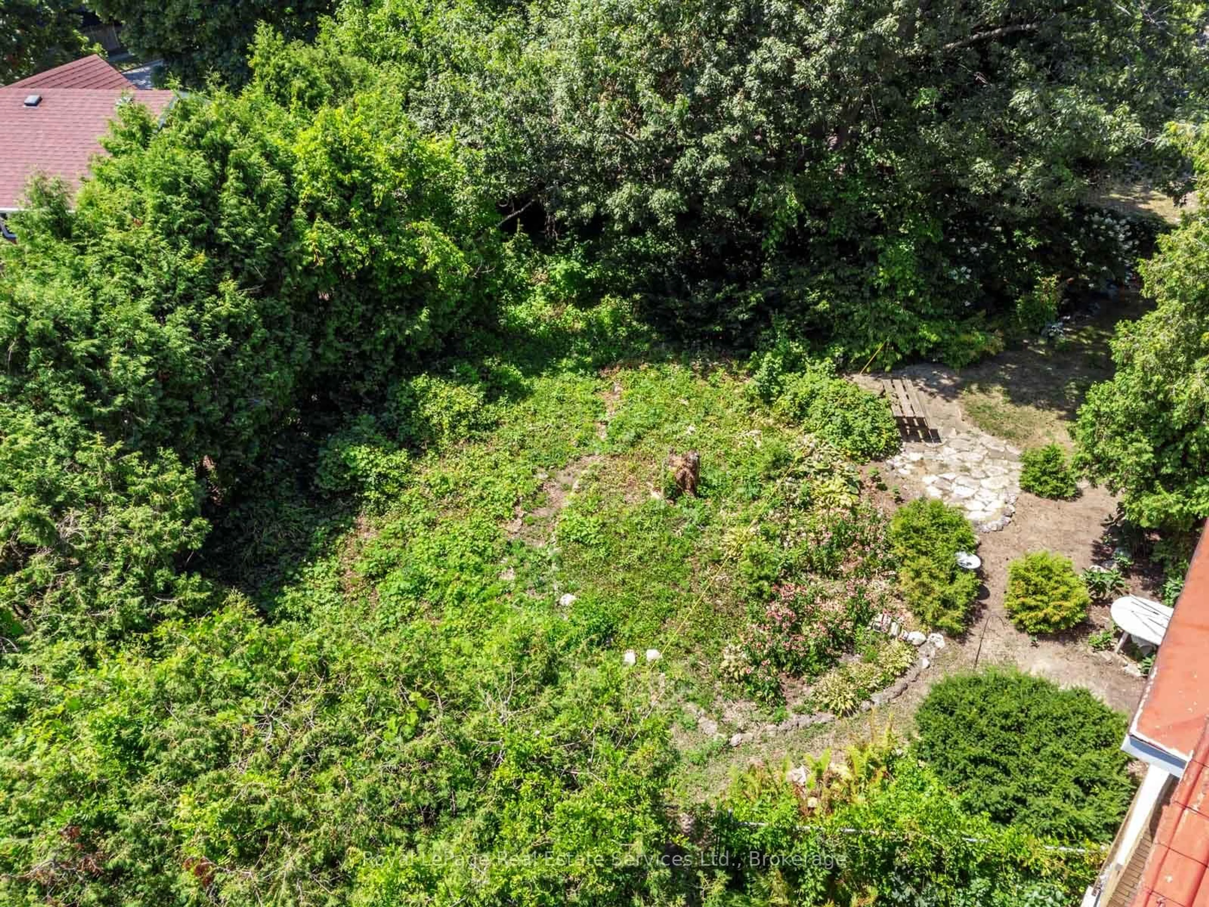 A pic from outside/outdoor area/front of a property/back of a property/a pic from drone, forest/trees view for 0 Victoria St, Oakville Ontario L6L 5X8
