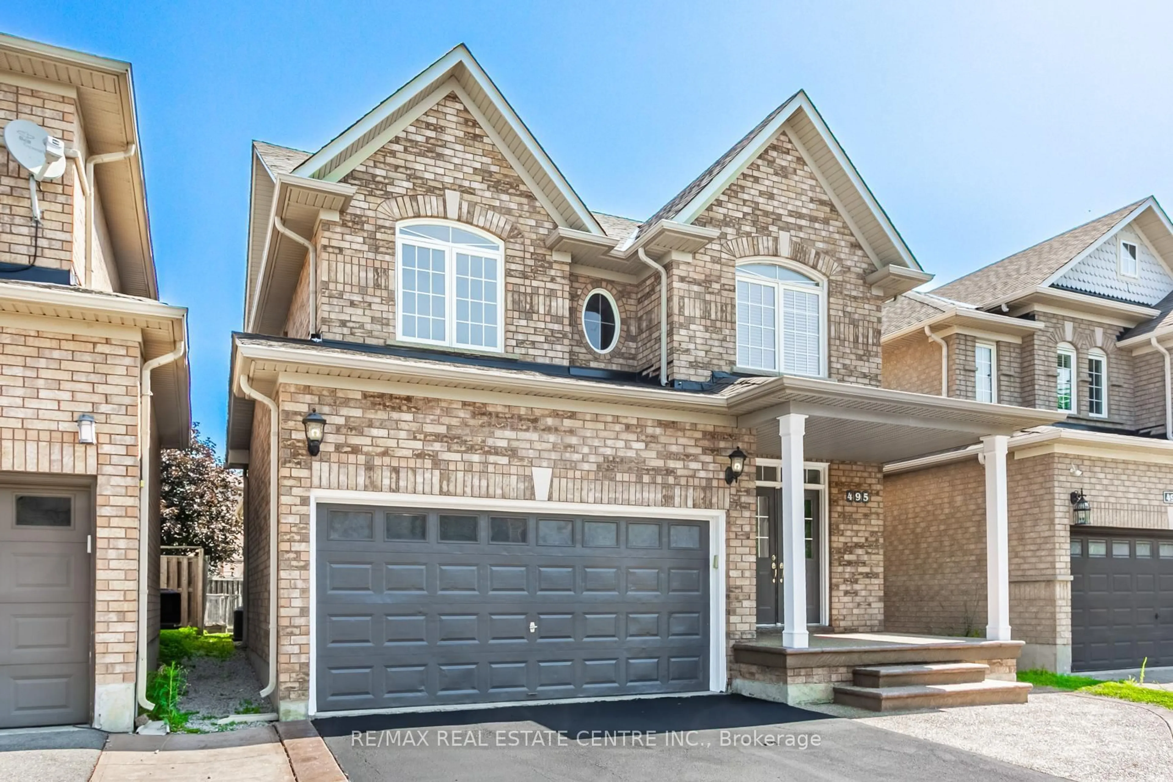 Home with brick exterior material, street for 495 Willmott Cres, Milton Ontario L9T 6P1