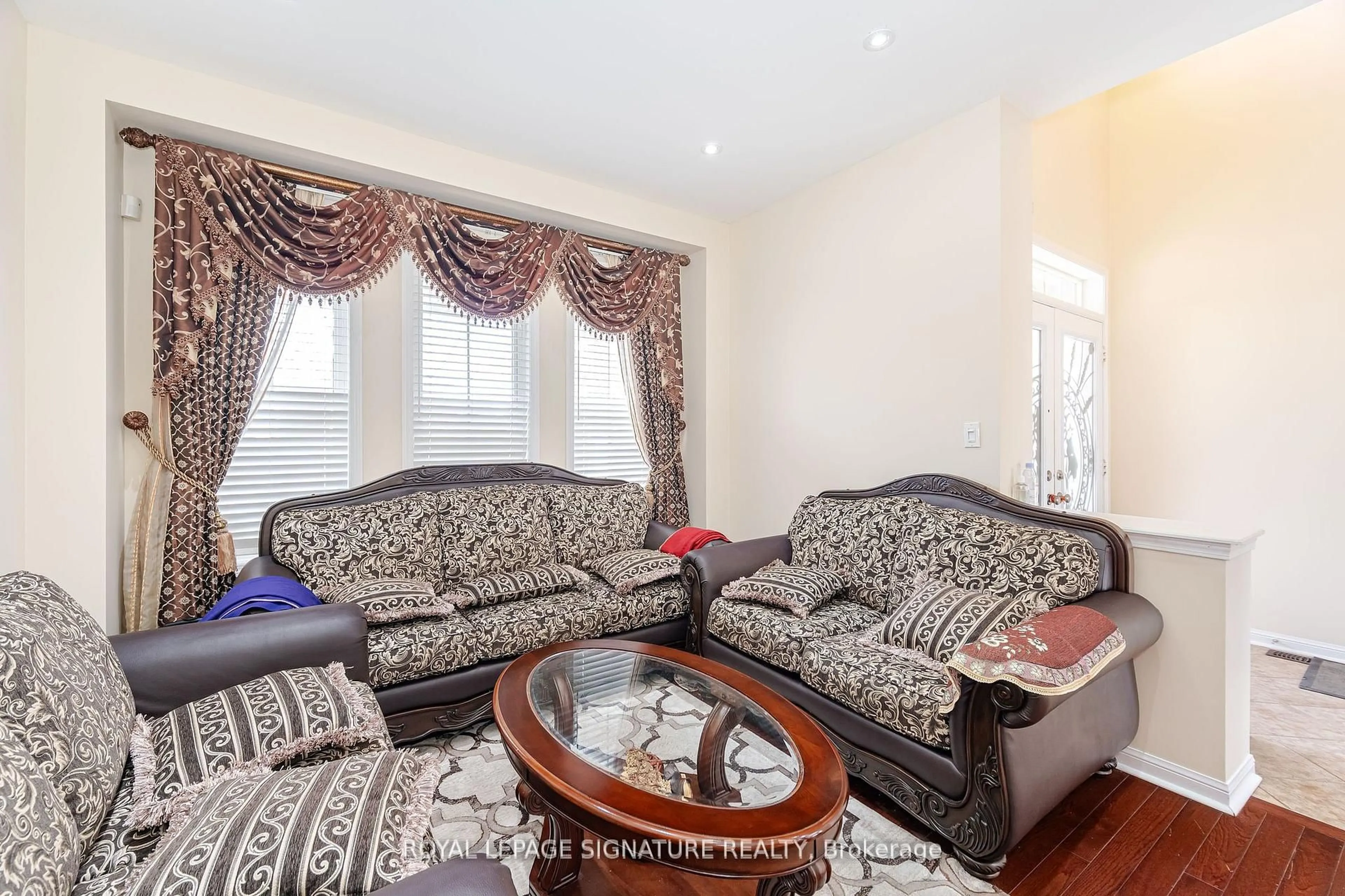 Living room with furniture, unknown for 21 Alboreto Way, Brampton Ontario L6X 0N5