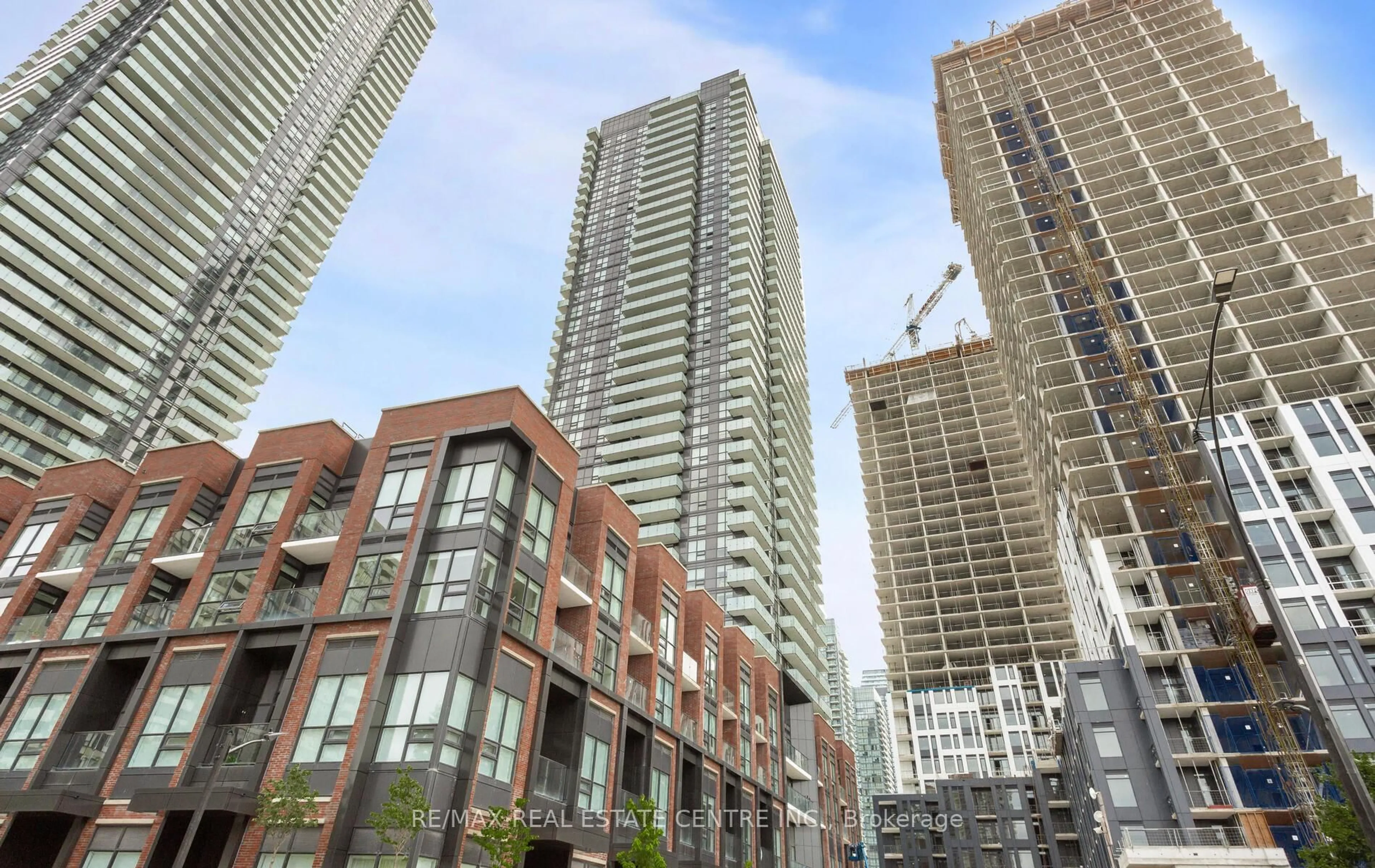 Patio, city buildings view from balcony for 4130 Parkside Village Dr #PH10, Mississauga Ontario L5B 3M8