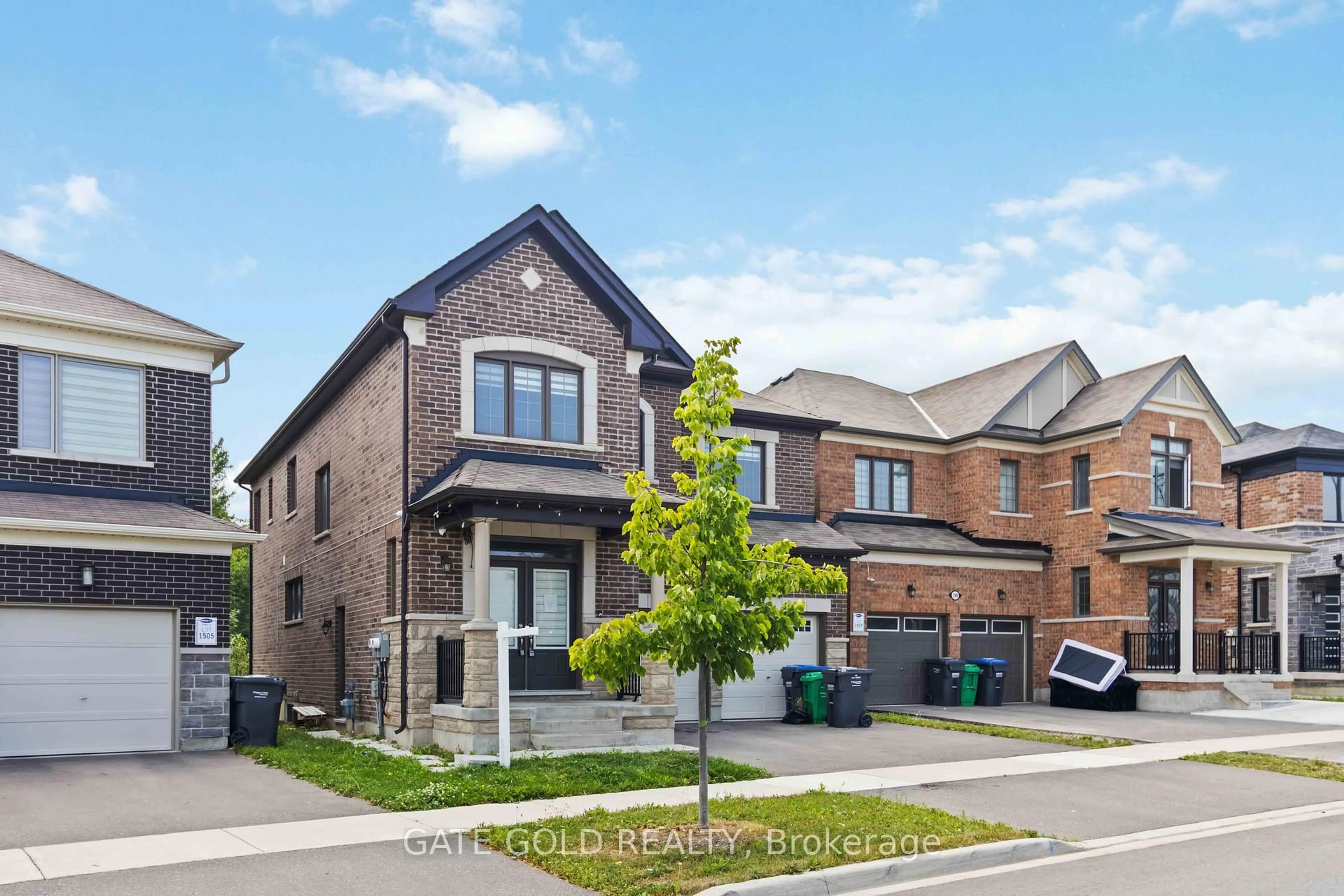 Home with brick exterior material, street for 588 Queen Mary Dr, Brampton Ontario L7A 5H5
