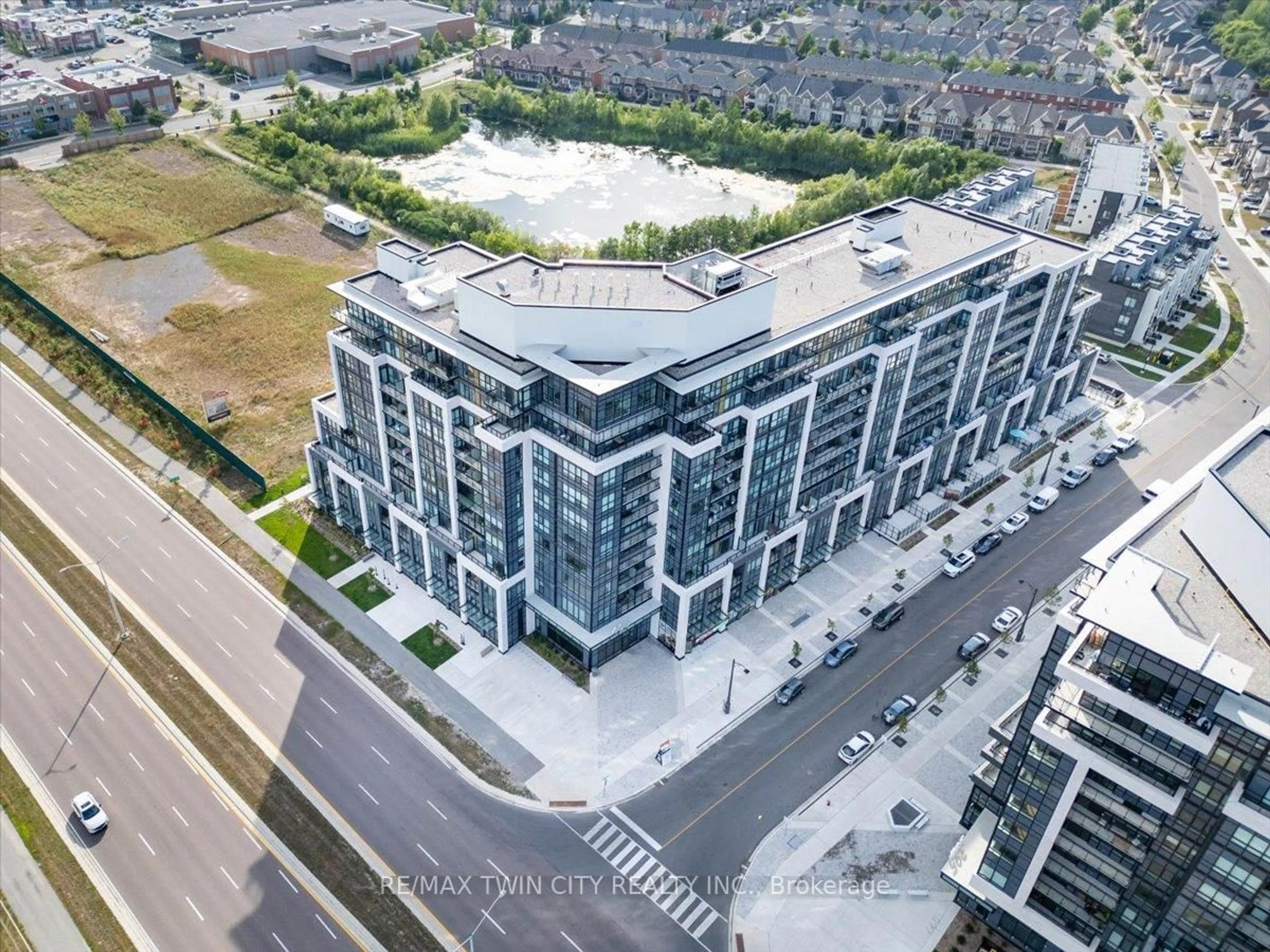 A pic from outside/outdoor area/front of a property/back of a property/a pic from drone, city buildings view from balcony for 405 dundas St #240, Oakville Ontario L6M 5P9