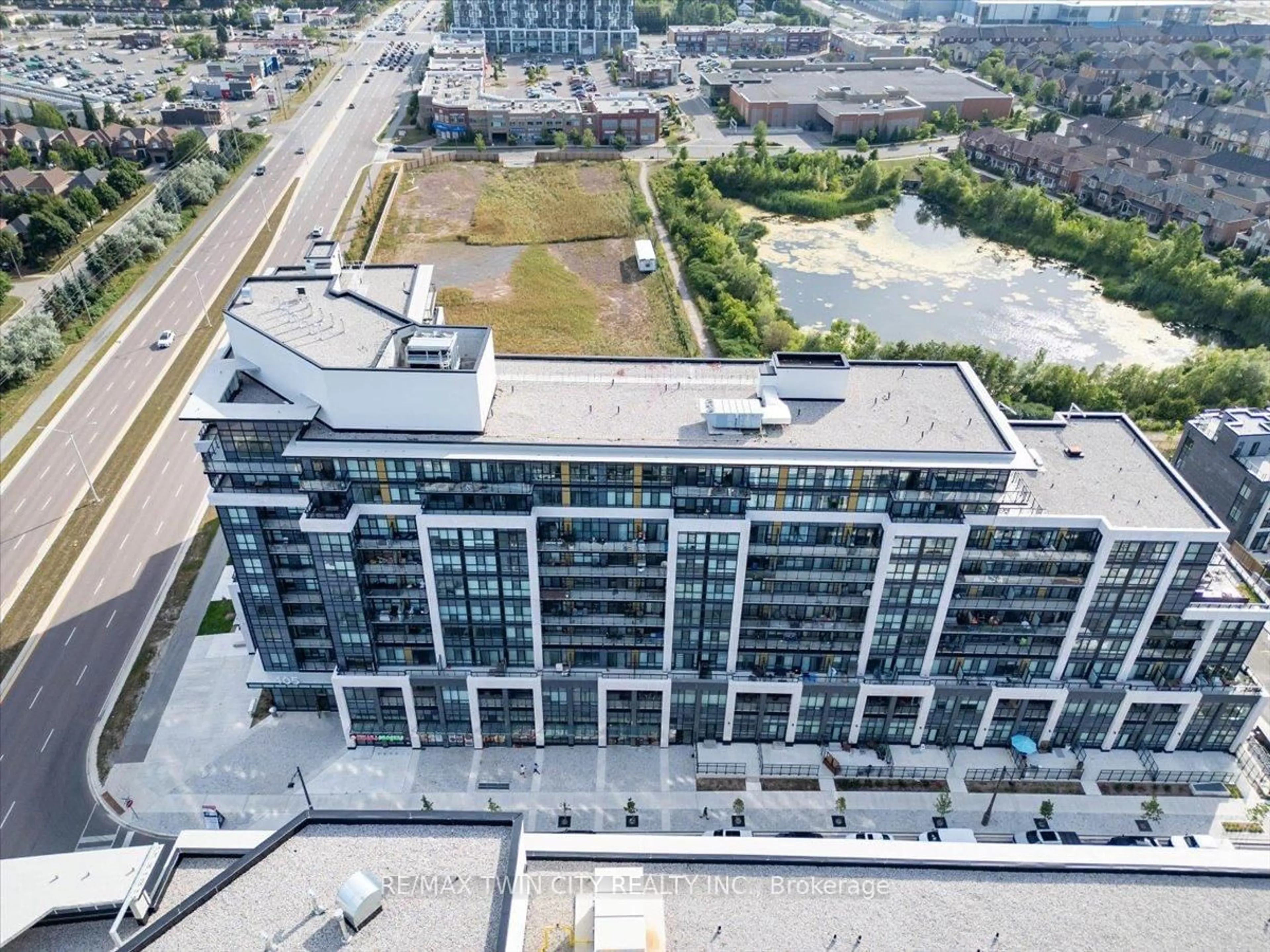 A pic from outside/outdoor area/front of a property/back of a property/a pic from drone, city buildings view from balcony for 405 dundas St #240, Oakville Ontario L6M 5P9
