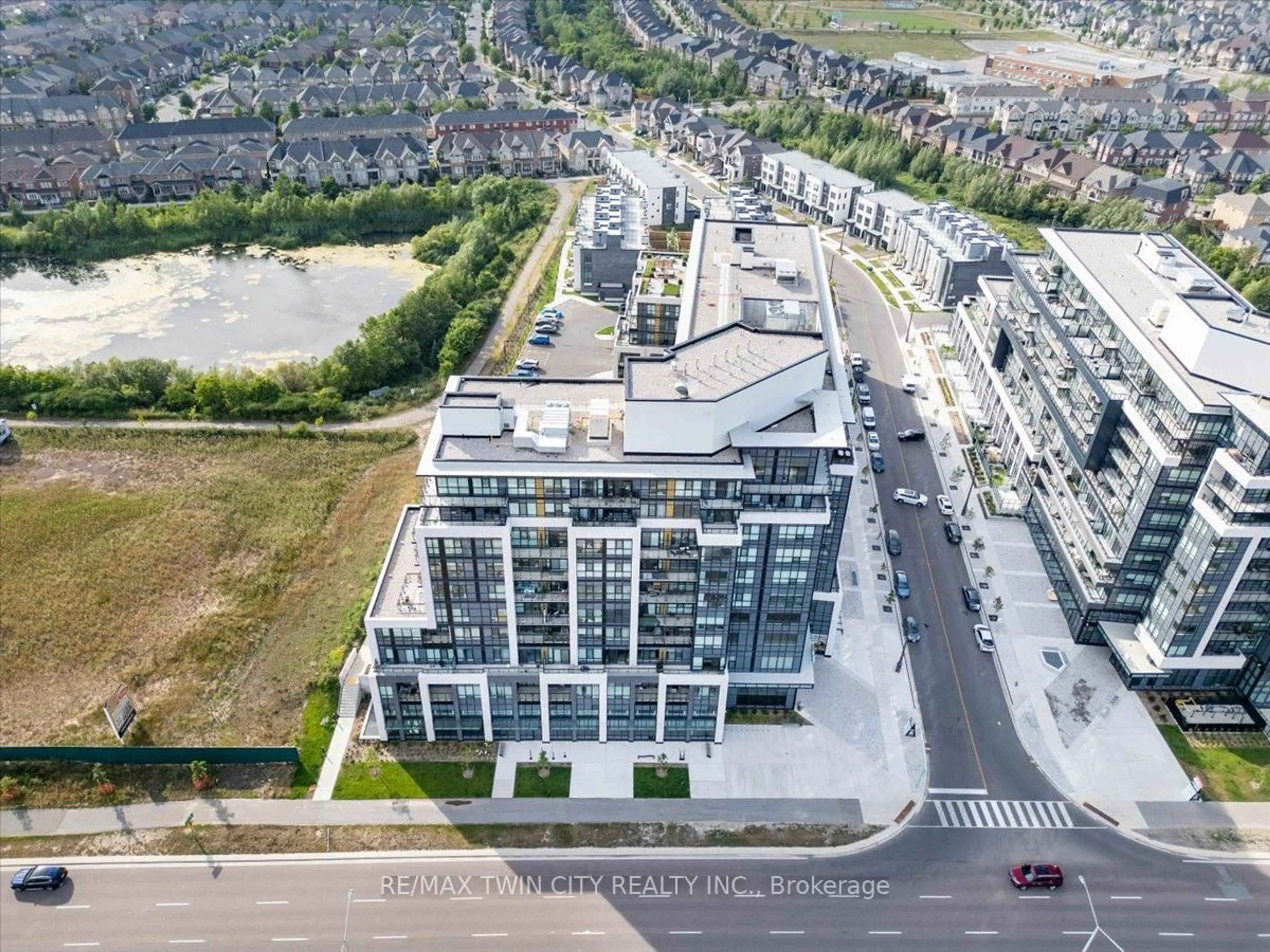 A pic from outside/outdoor area/front of a property/back of a property/a pic from drone, city buildings view from balcony for 405 dundas St #240, Oakville Ontario L6M 5P9