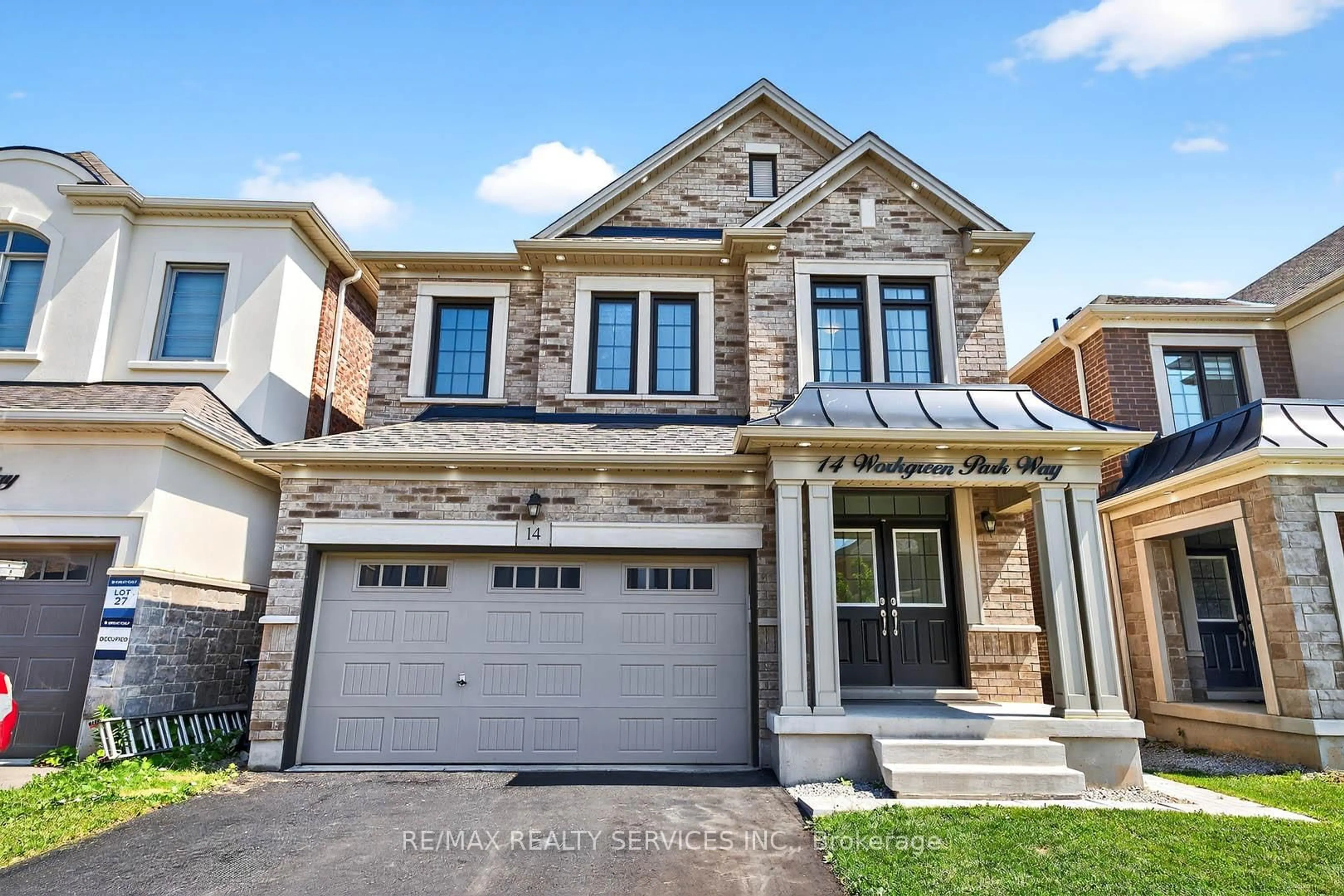 Home with brick exterior material, street for 14 Workgreen Park Way, Brampton Ontario L6Y 6J5