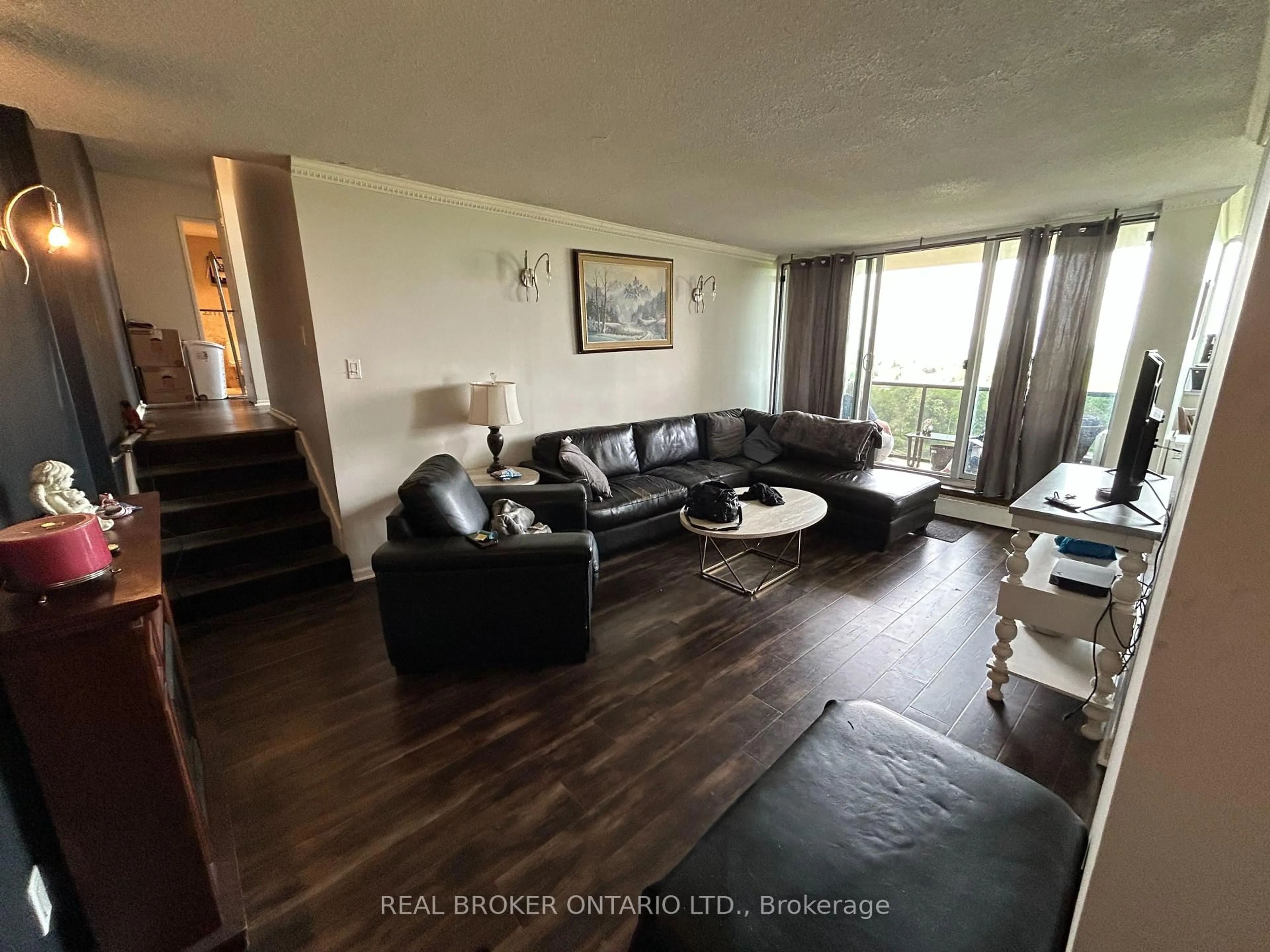 Living room with furniture, unknown for 530 Lolita Gdns #1203, Mississauga Ontario L5A 3T2