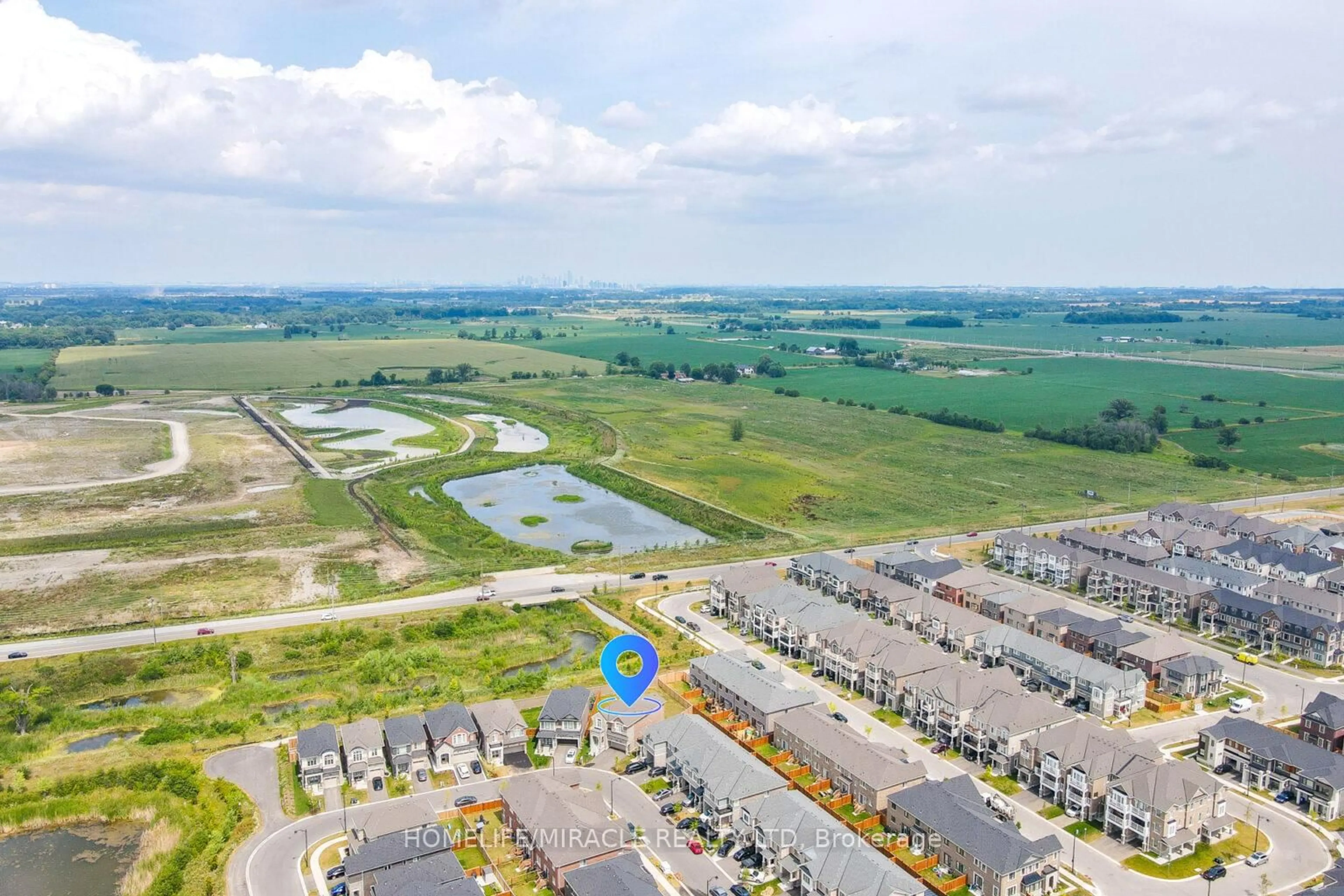 A pic from outside/outdoor area/front of a property/back of a property/a pic from drone, water/lake/river/ocean view for 1725 Thames Circ, Milton Ontario L9E 1Y5