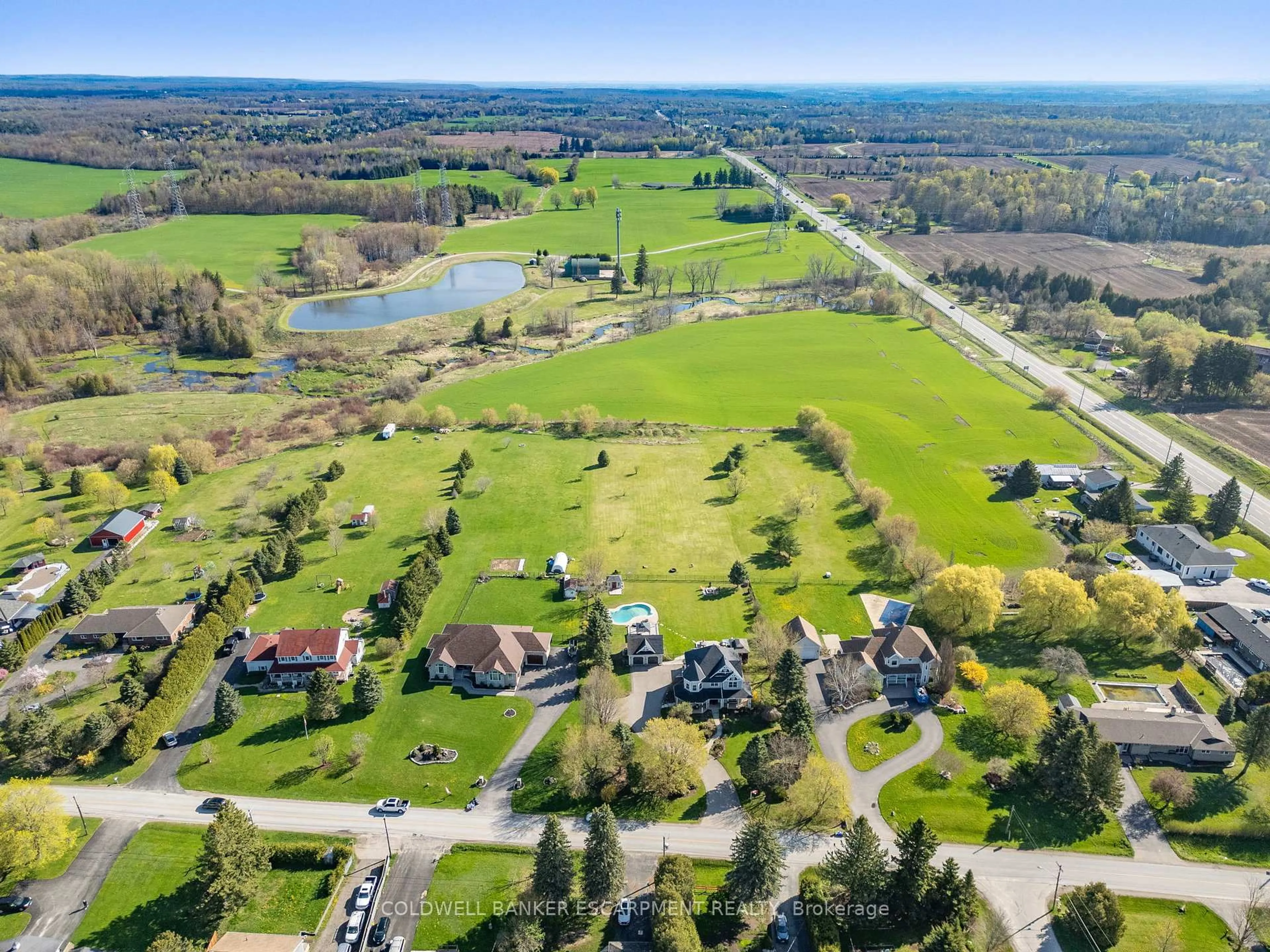 A pic from outside/outdoor area/front of a property/back of a property/a pic from drone, water/lake/river/ocean view for 13467 Fourth Line, Halton Hills Ontario L7J 2L8