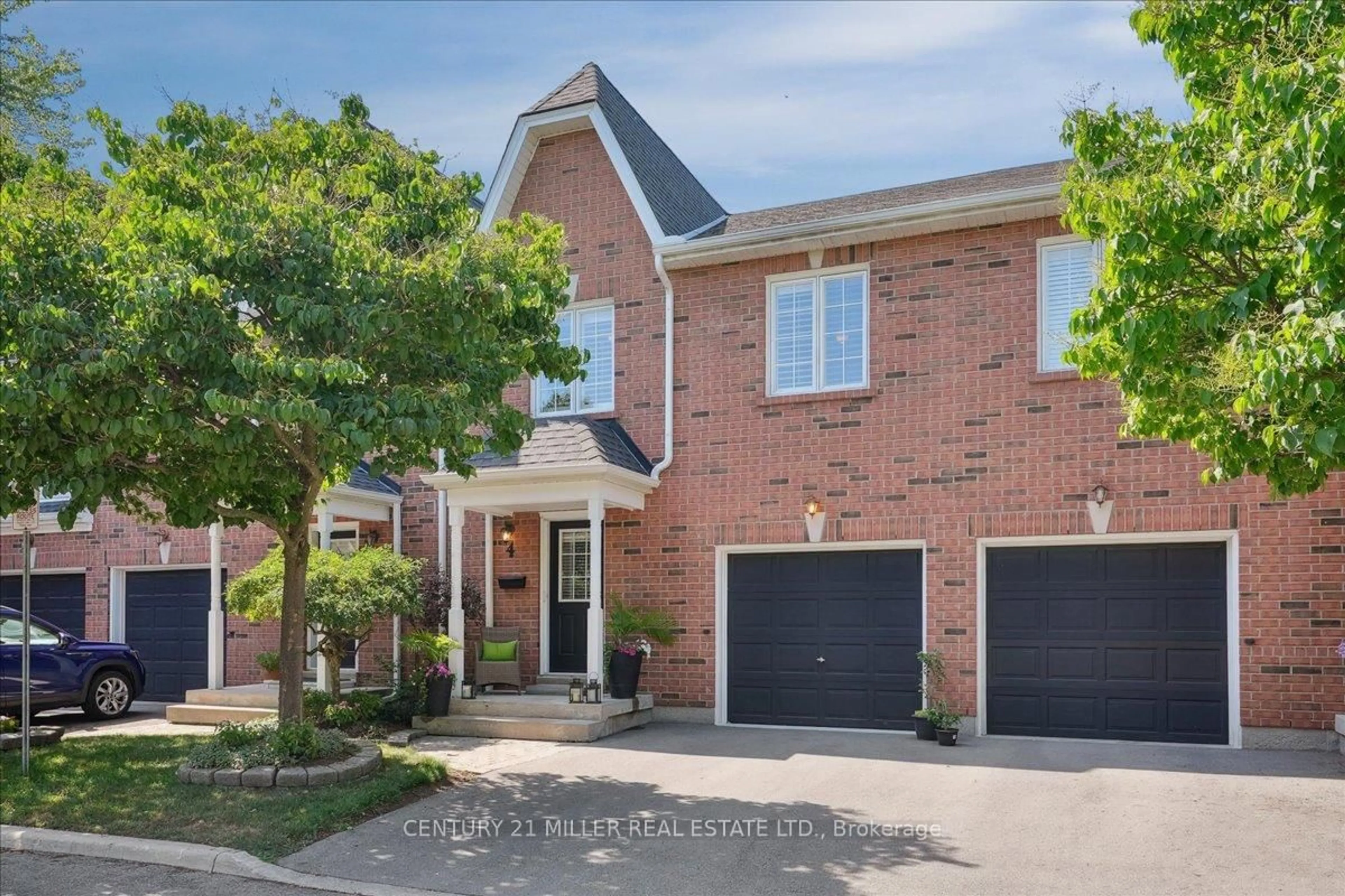 Home with brick exterior material, street for 5427 Lakeshore Rd #4, Burlington Ontario L7L 1E1