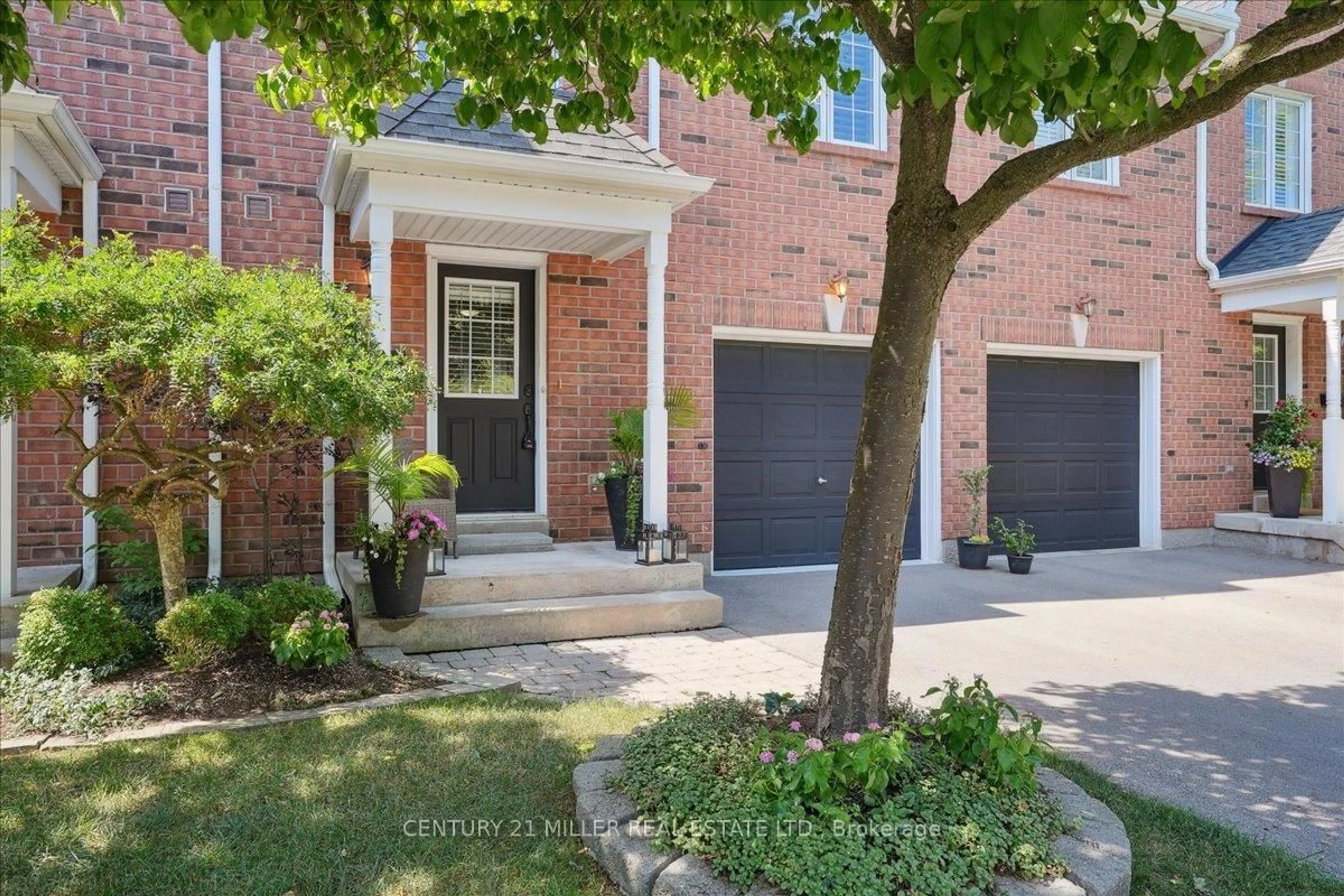 Home with brick exterior material, street for 5427 Lakeshore Rd #4, Burlington Ontario L7L 1E1