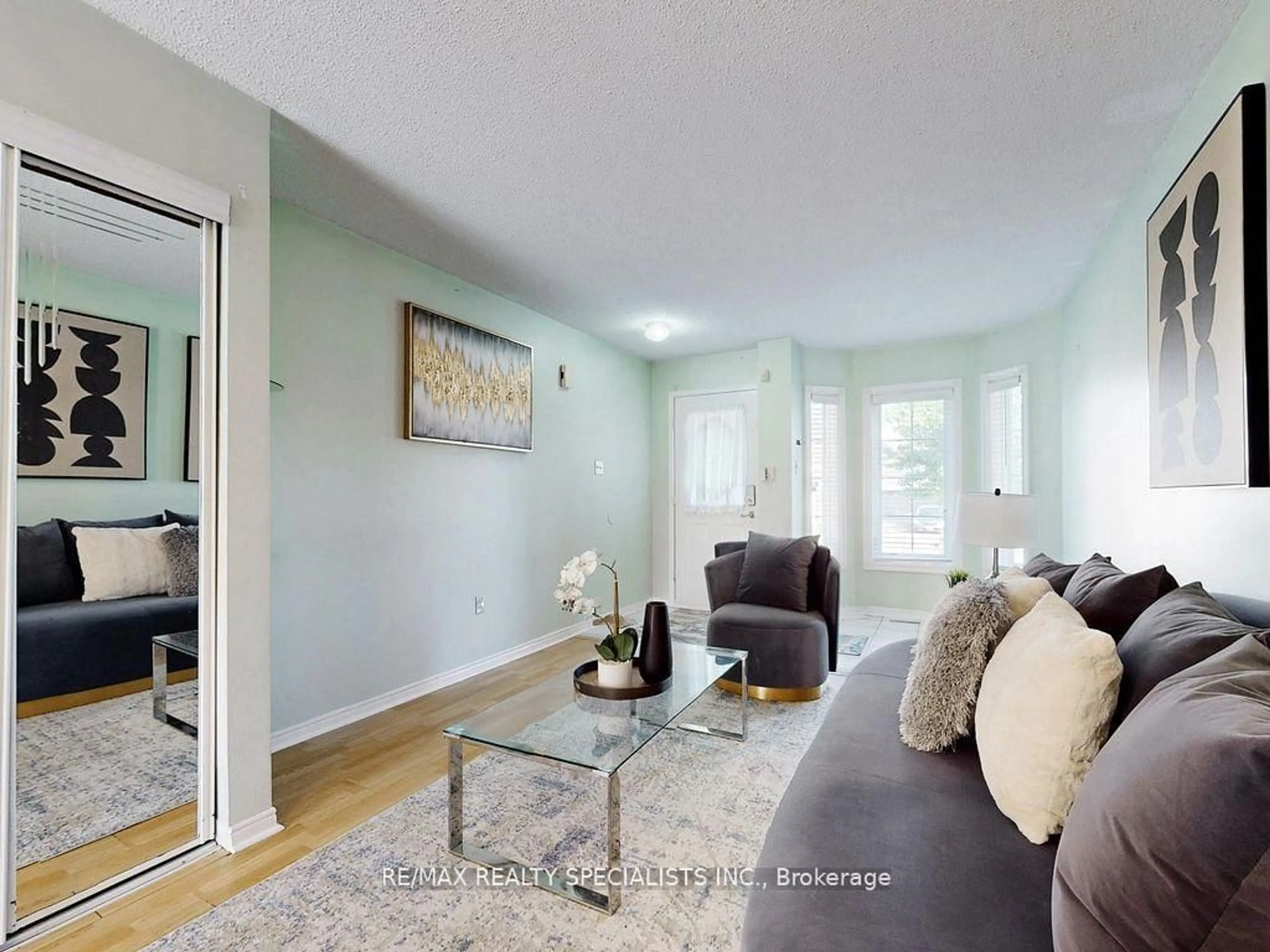 Living room with furniture, unknown for 23 Arthurs Cres, Brampton Ontario L6Y 4Y2