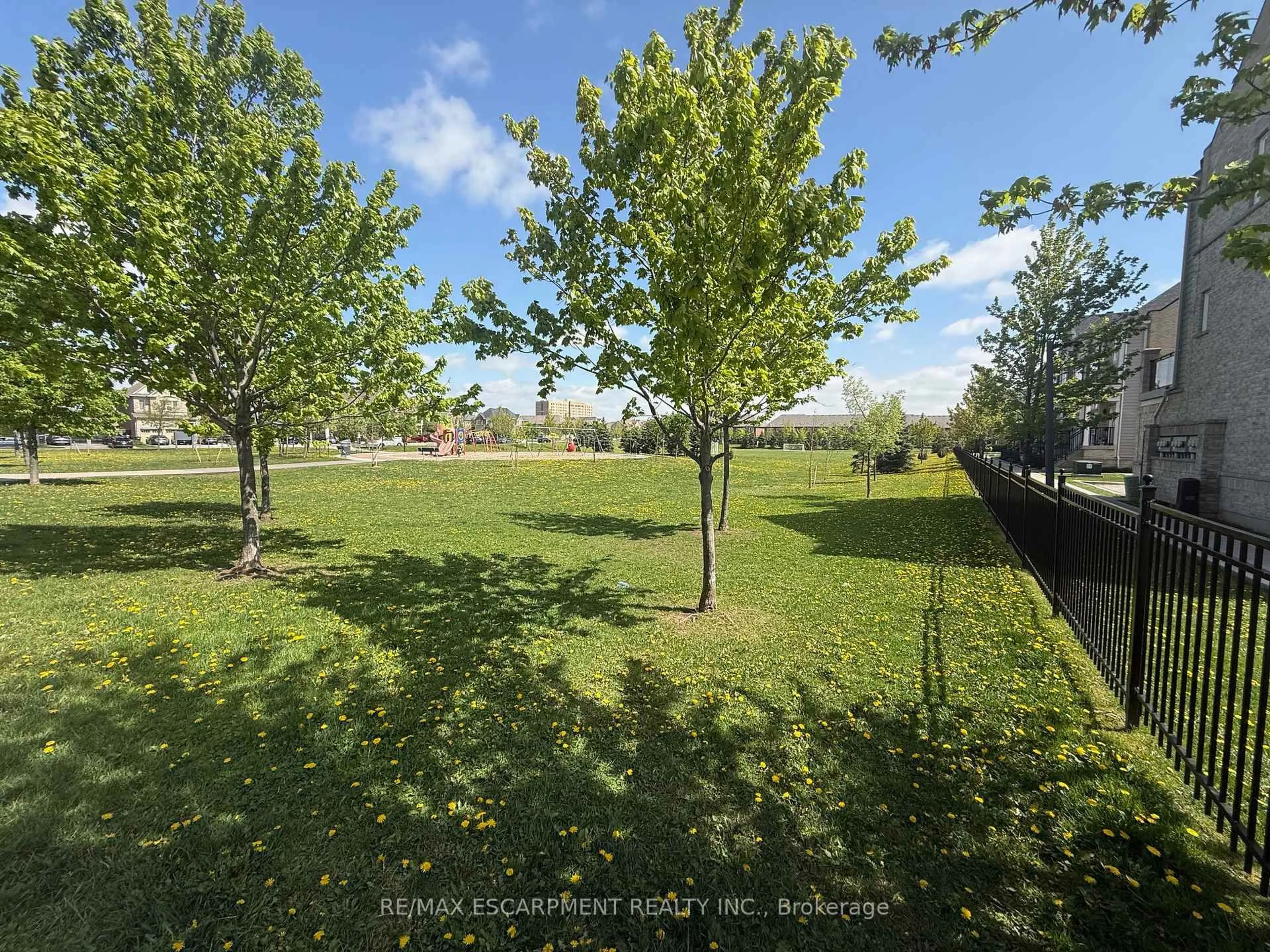 A pic from outside/outdoor area/front of a property/back of a property/a pic from drone, forest/trees view for 5055 Oscar Peterson Blvd #8, Mississauga Ontario L5M 0P4
