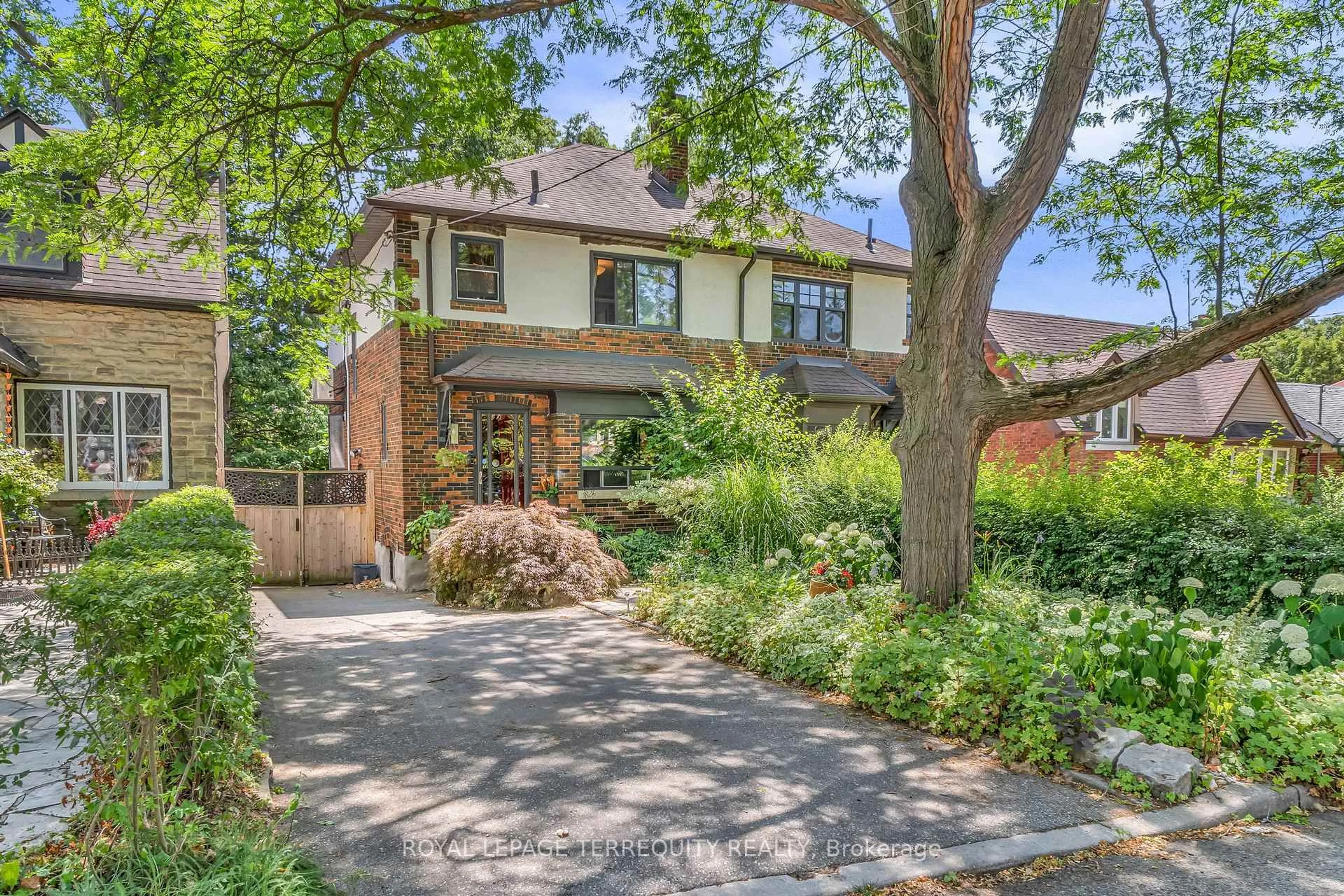Home with brick exterior material, street for 5 Verbena Ave, Toronto Ontario M6S 1J9