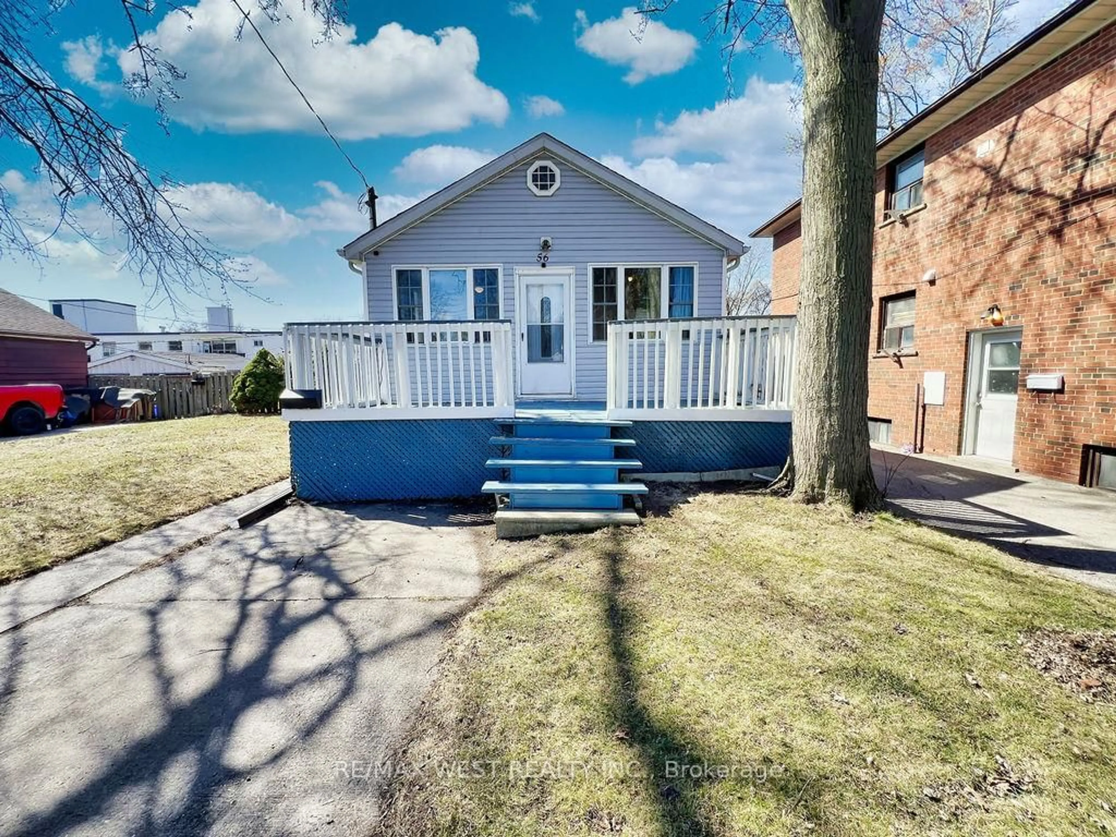 A pic from outside/outdoor area/front of a property/back of a property/a pic from drone, street for 56 Forty First St, Toronto Ontario M8W 3N6