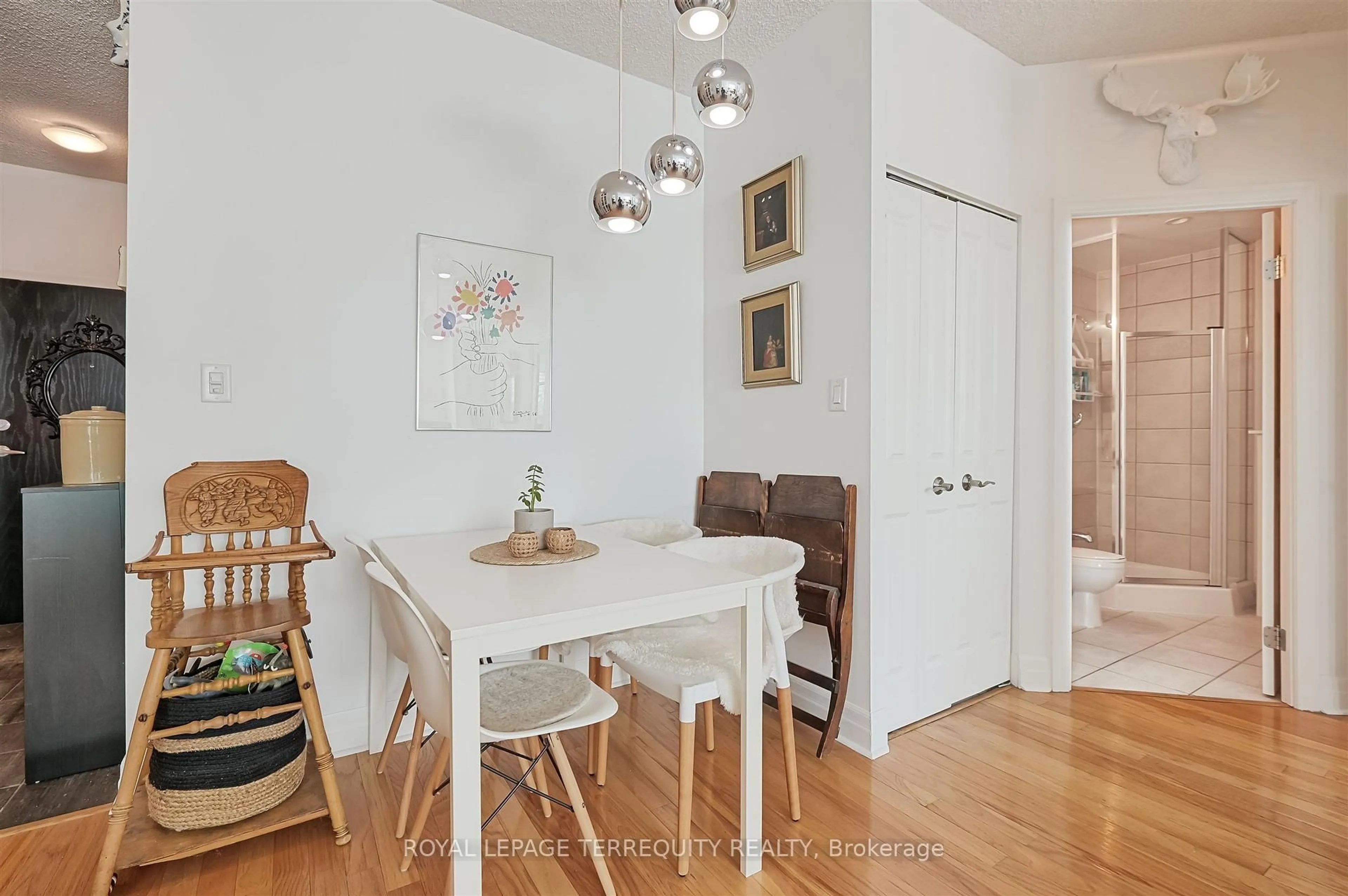 Dining room, wood/laminate floor for 88 Palace Pier Crt #705, Toronto Ontario M8V 4C2