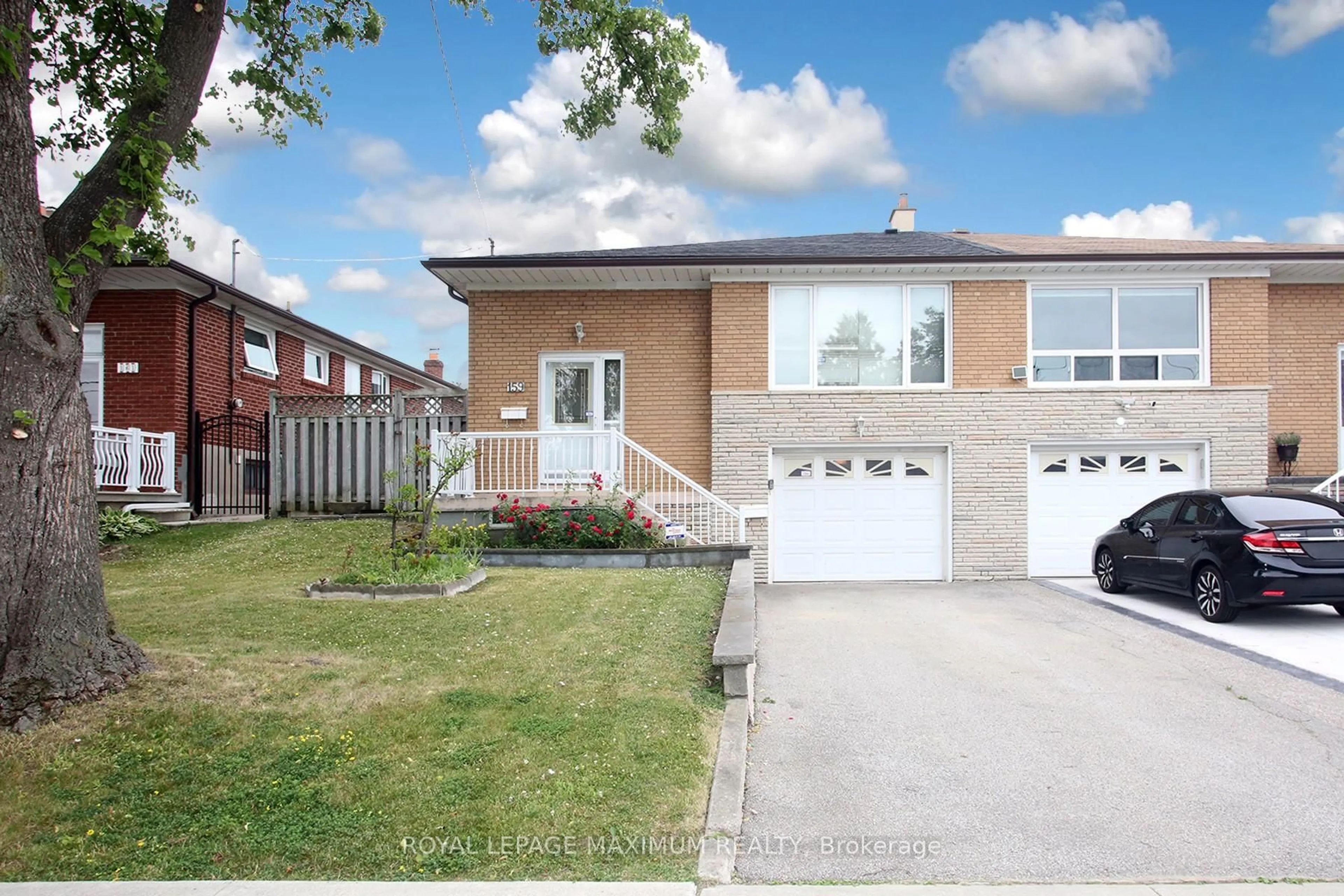 Home with brick exterior material, street for 159 Spenvalley Dr, Toronto Ontario M3L 1Z8