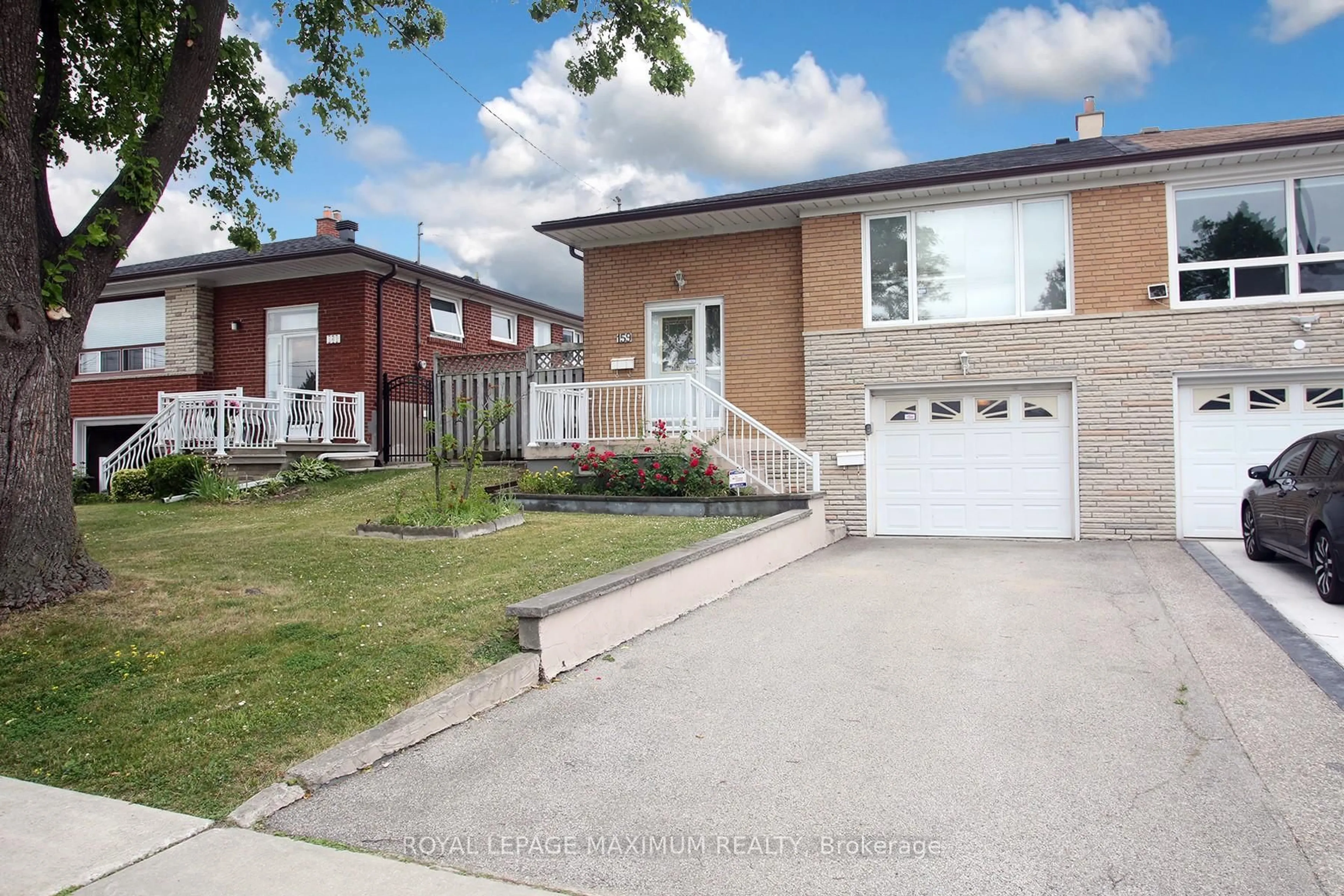 Home with brick exterior material, street for 159 Spenvalley Dr, Toronto Ontario M3L 1Z8