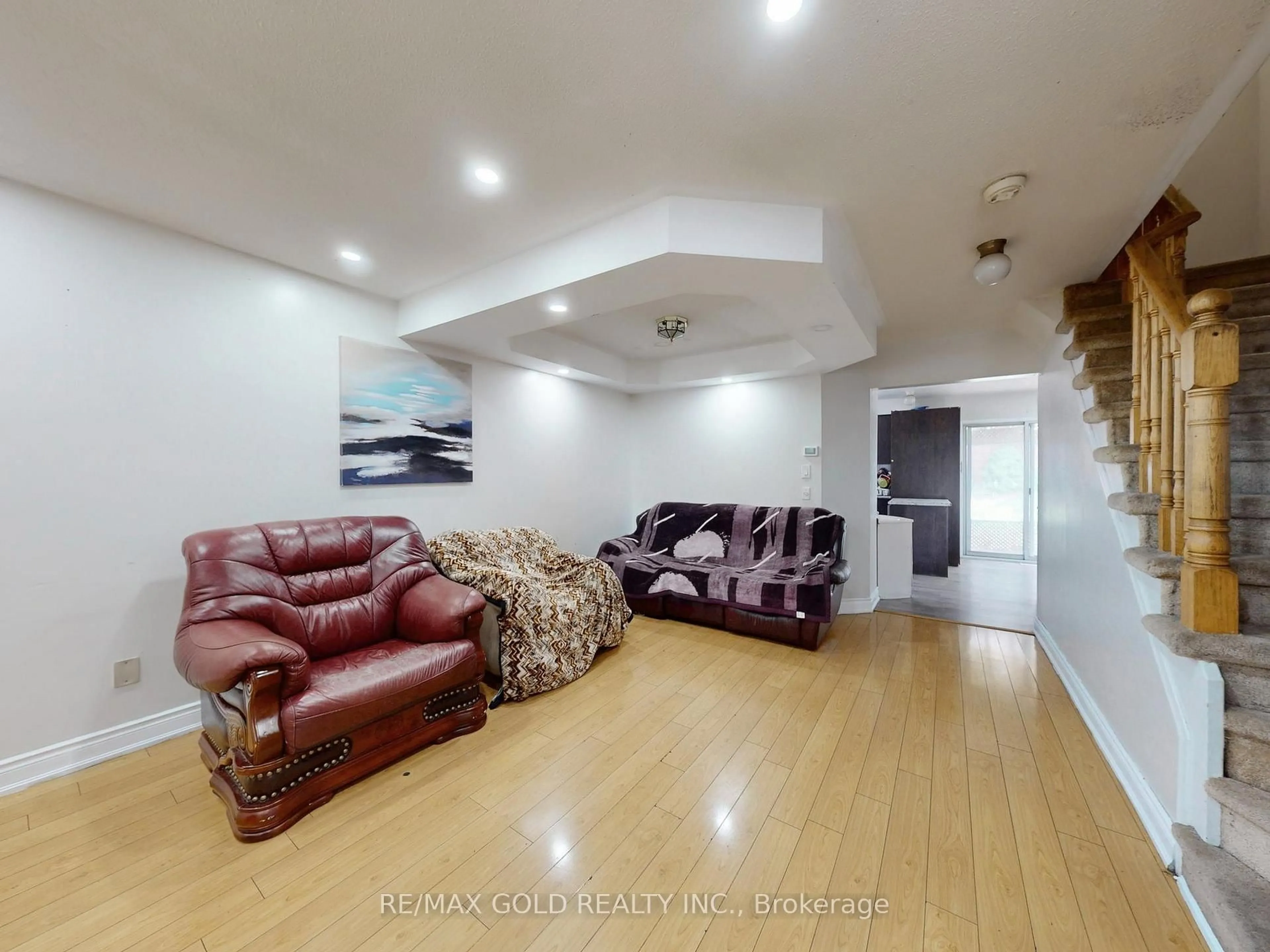Living room with furniture, wood/laminate floor for 78 Fern Valley Cres, Brampton Ontario L6R 1K5