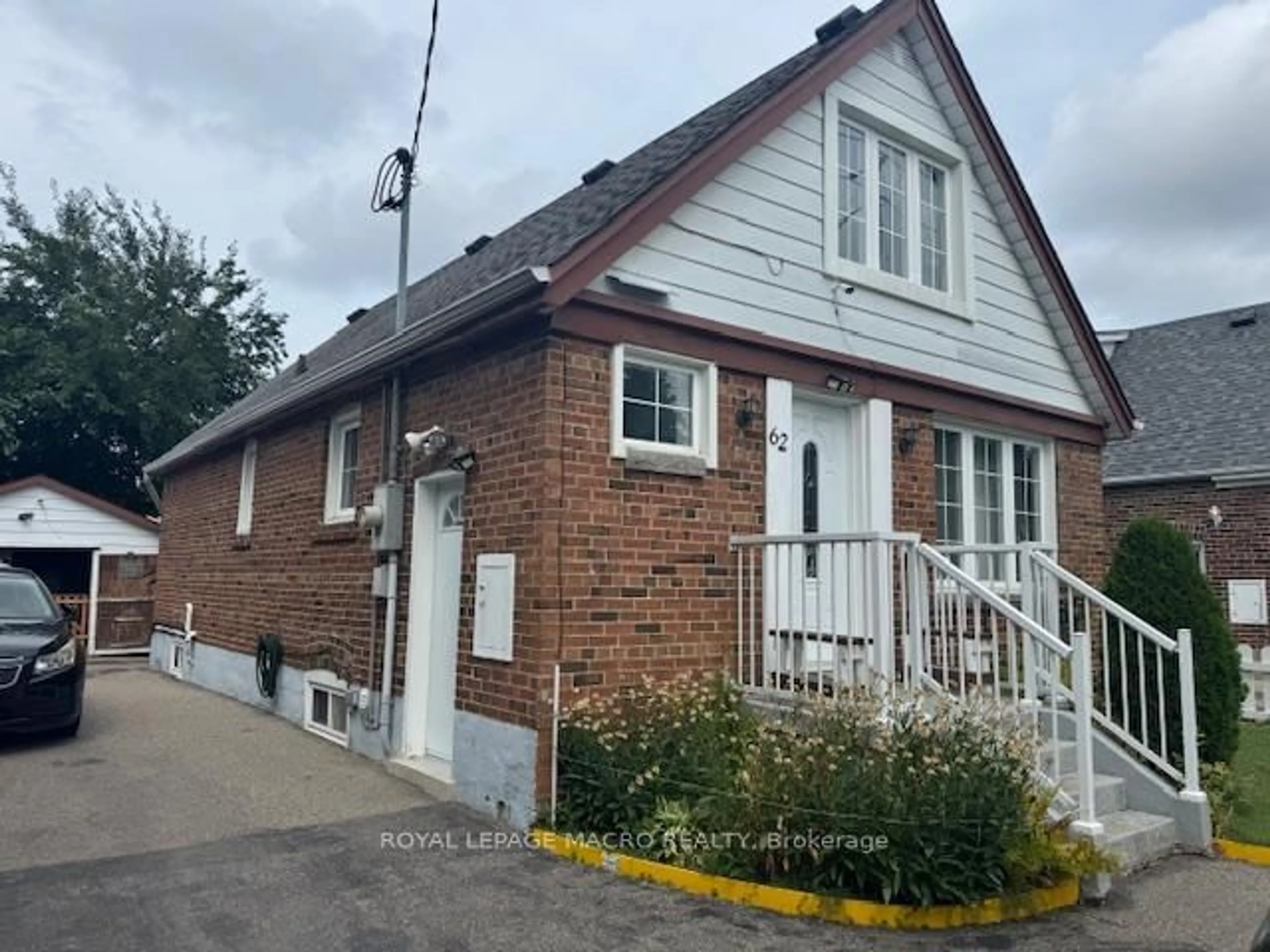 Home with brick exterior material, street for 62 Brookhaven Dr, Toronto Ontario M6M 4N8
