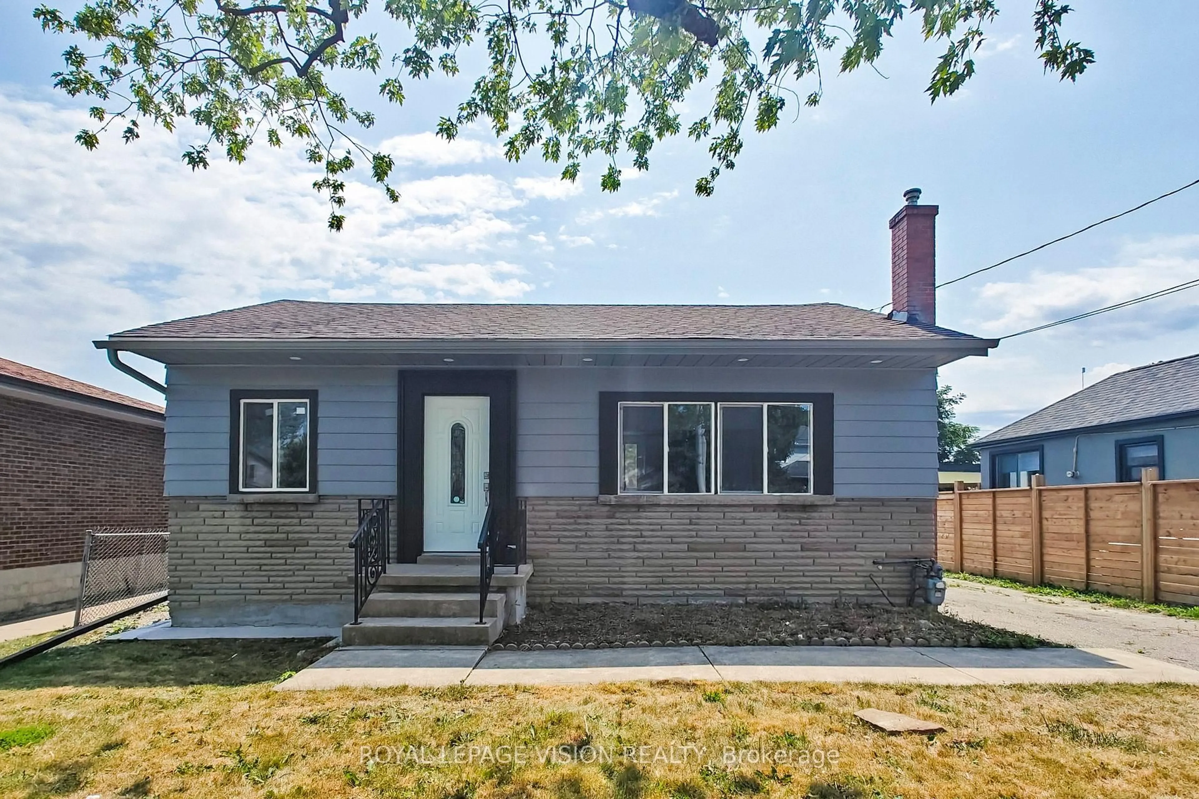 Home with brick exterior material, street for 406 Marf Ave, Mississauga Ontario L5G 1T3