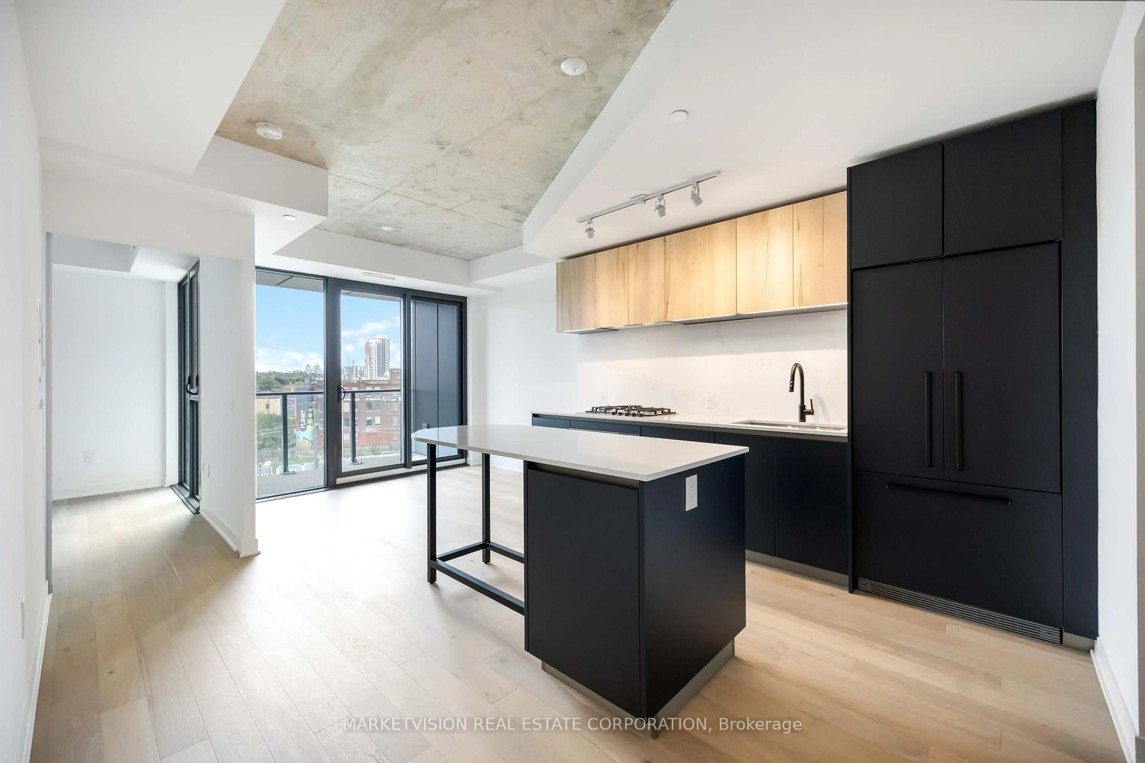 Open concept kitchen, unknown for 2625 Dundas St #610, Toronto Ontario M6P 1X9