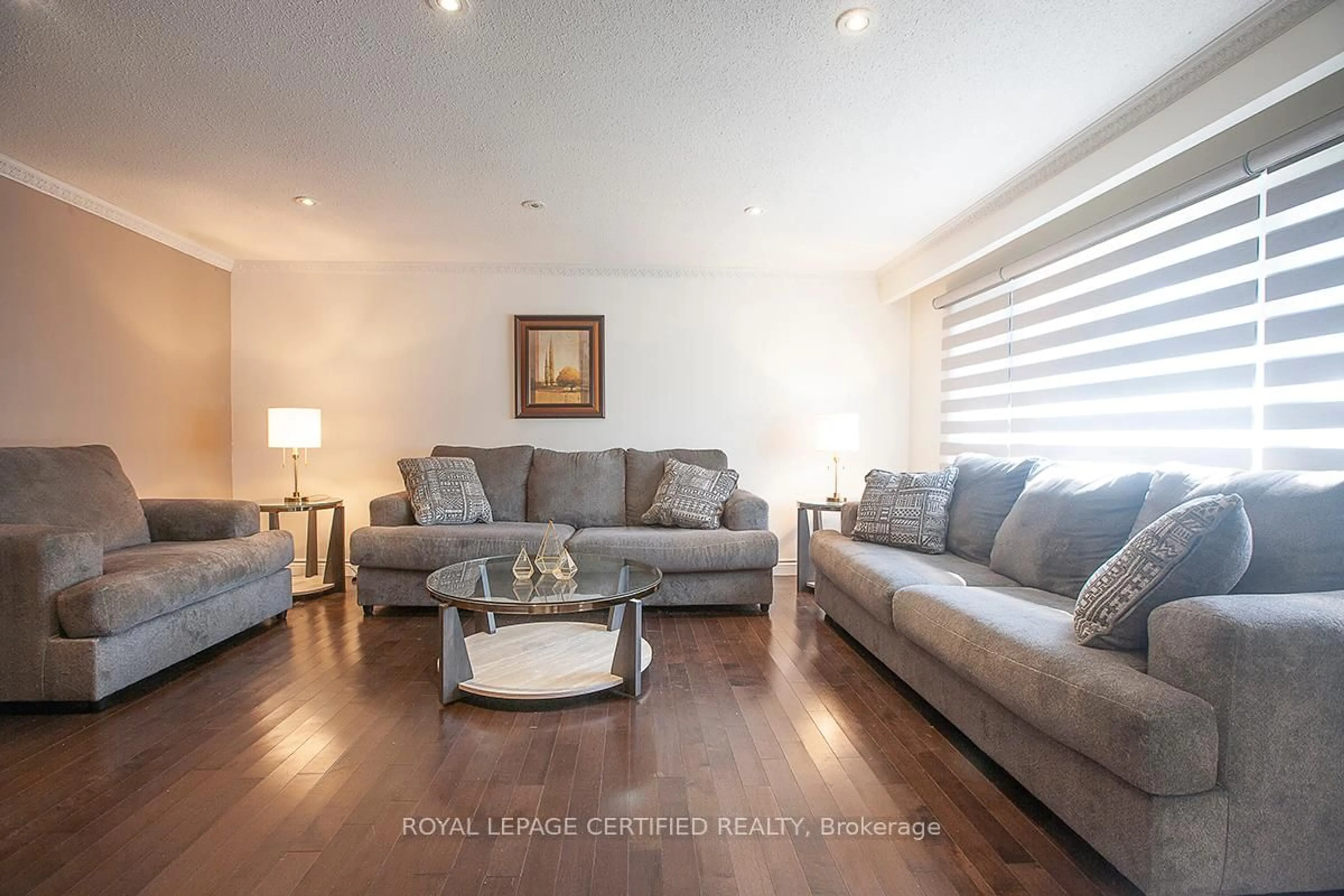 Living room with furniture, wood/laminate floor for 516 Woodward Ave, Milton Ontario L9T 3B8