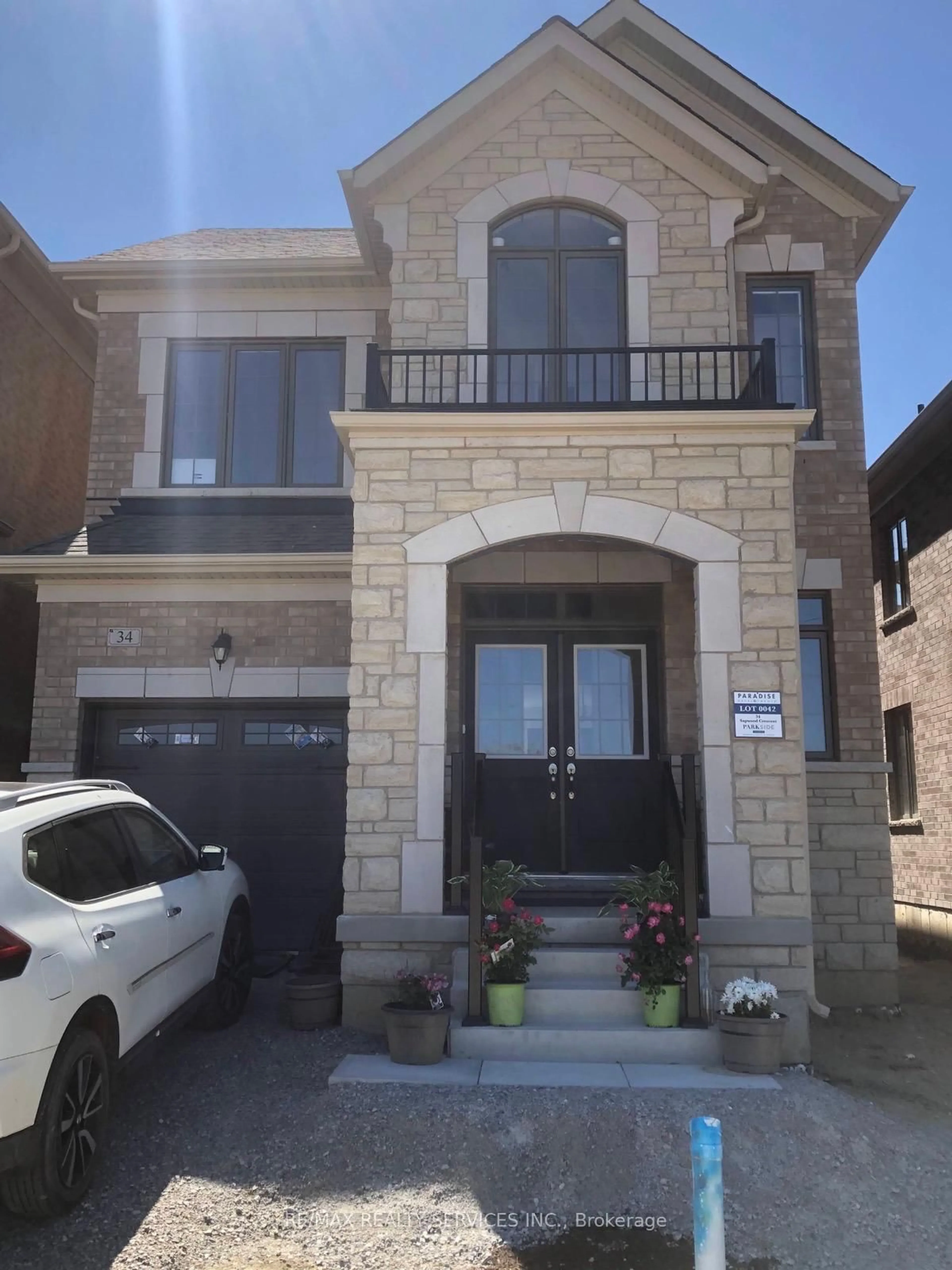 Home with brick exterior material, street for 34 Sapwood Cres, Brampton Ontario L6Z 1W5