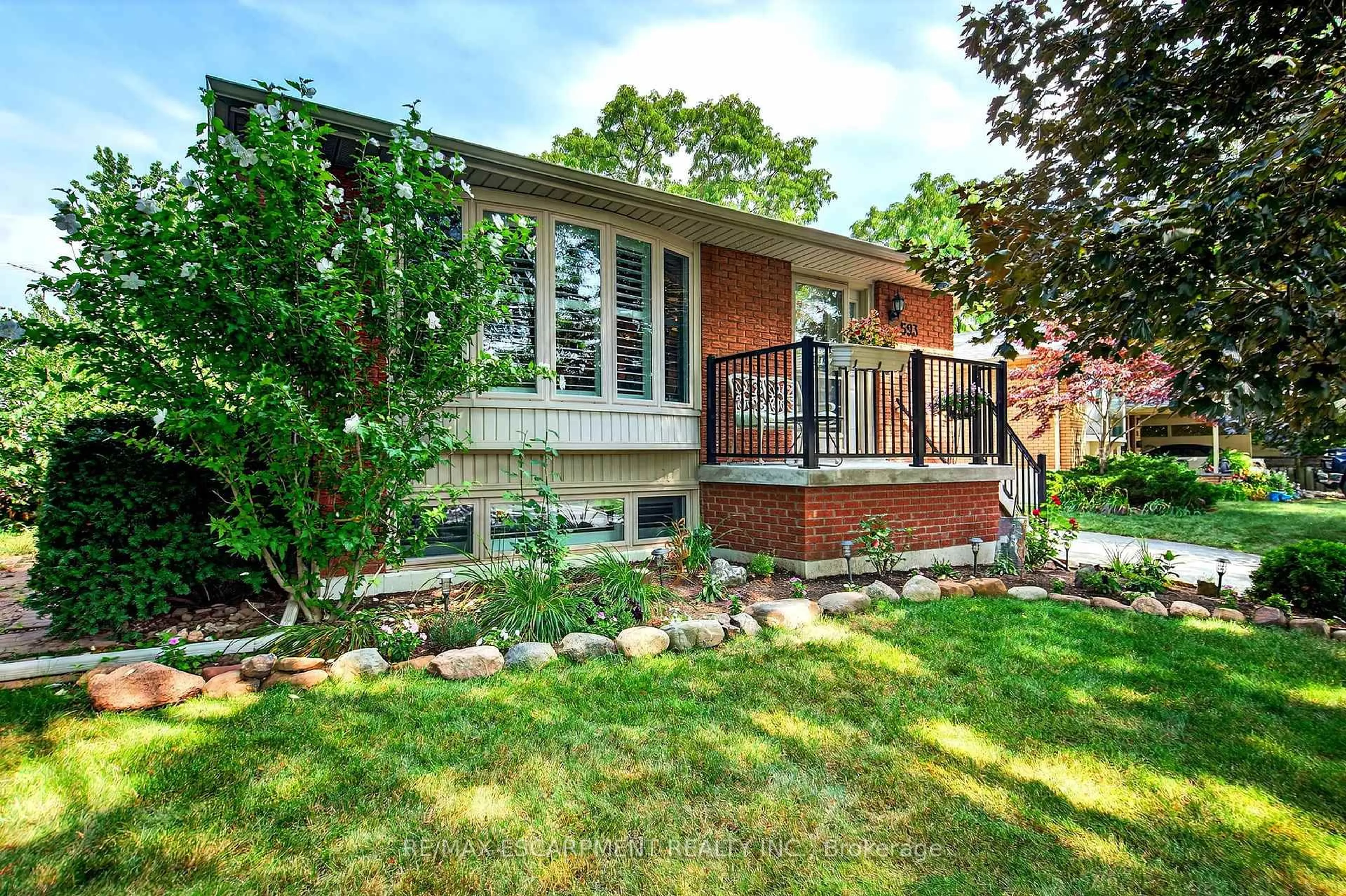 Home with brick exterior material, street for 593 Braemore Rd, Burlington Ontario L7N 3E4