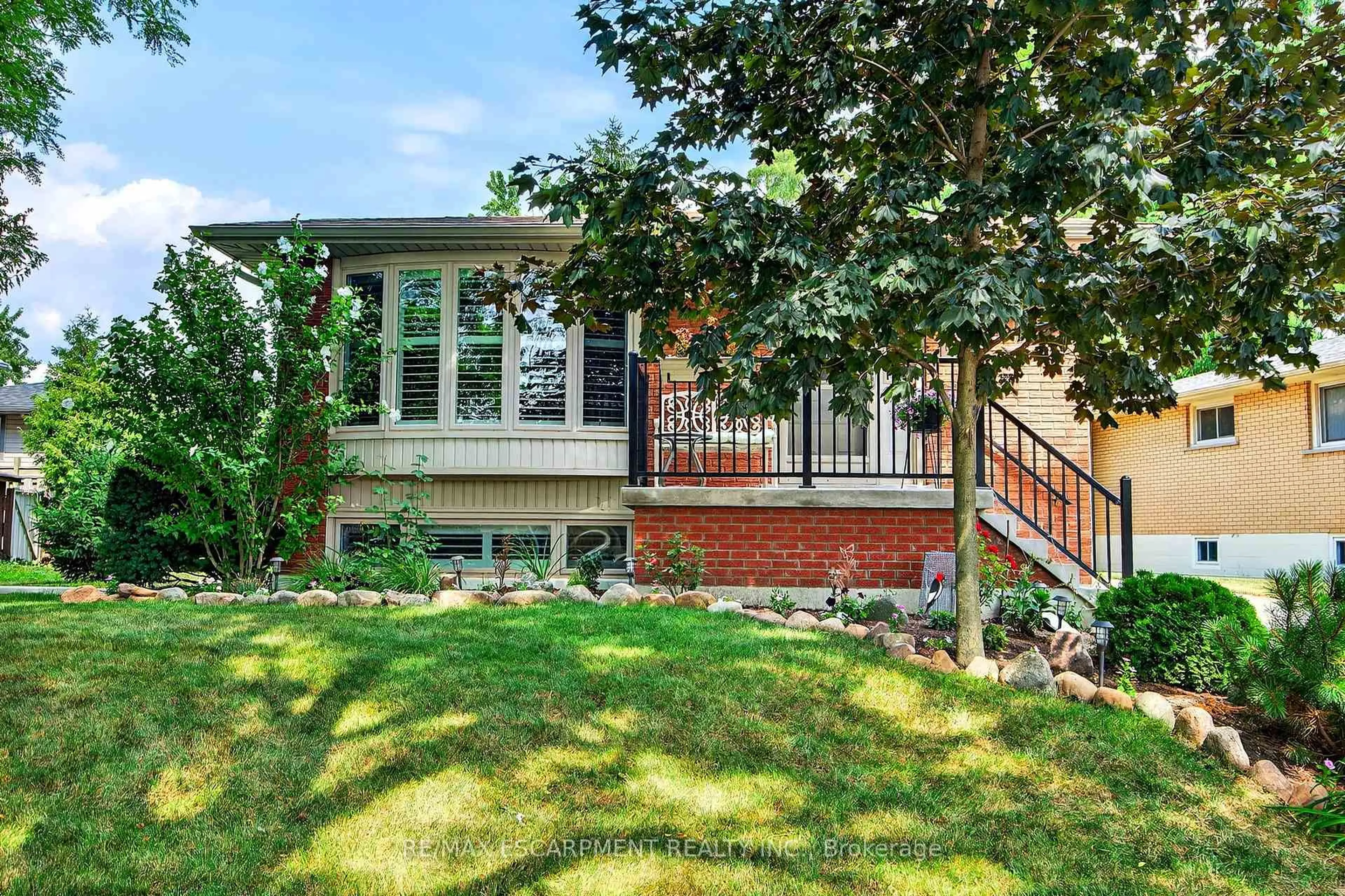 Home with brick exterior material, street for 593 Braemore Rd, Burlington Ontario L7N 3E4