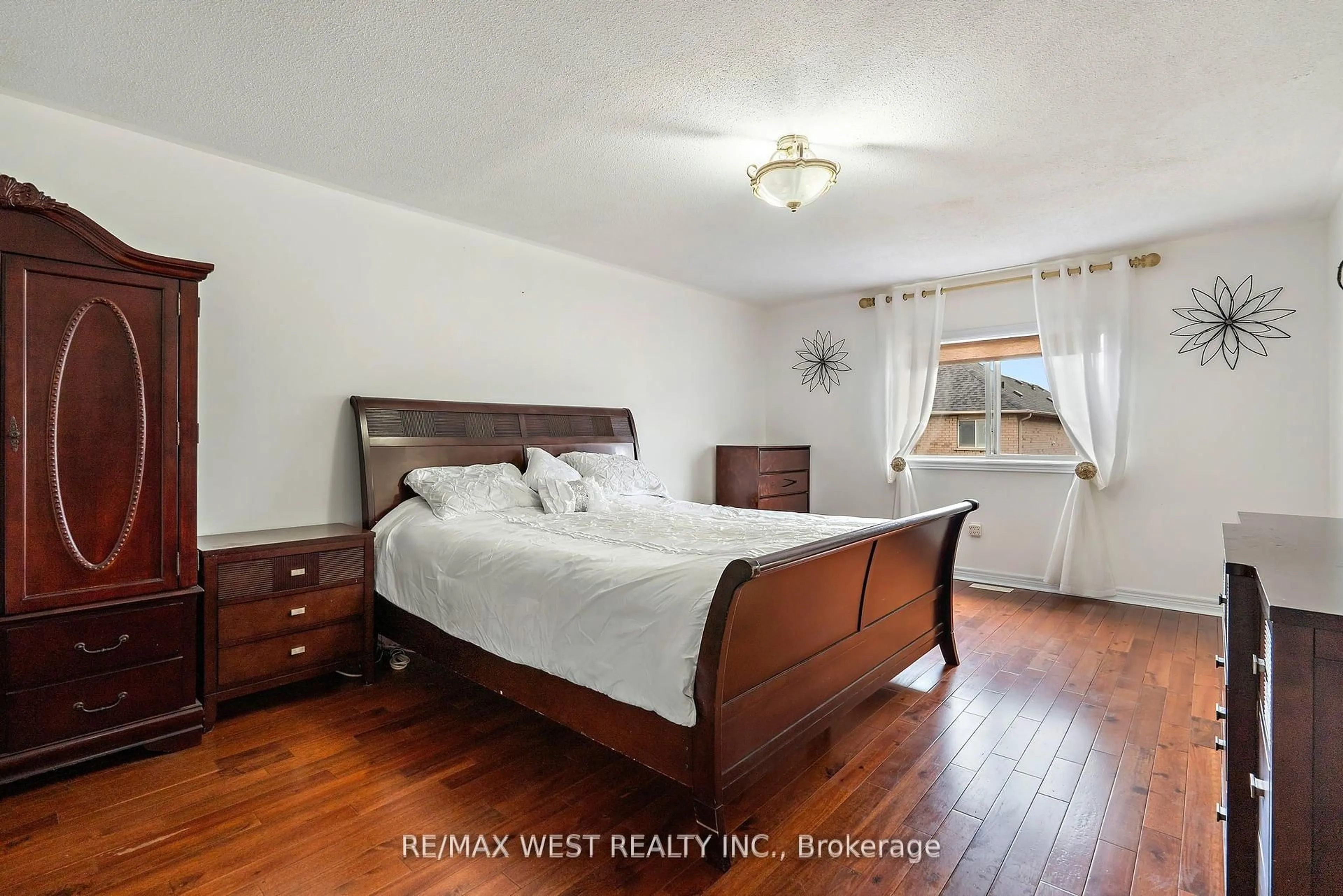 Bedroom with bed, wood/laminate floor for 43 Humbershed Cres, Caledon Ontario L7E 2X3