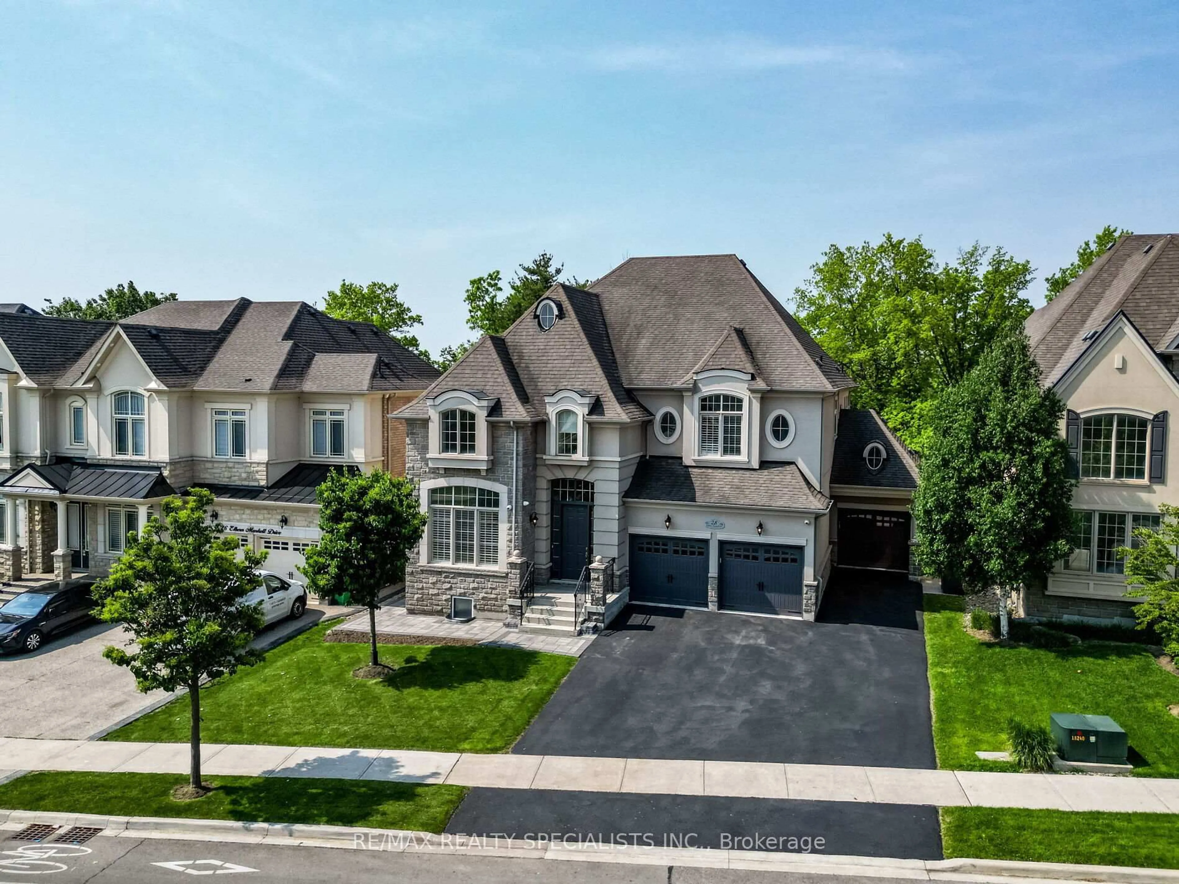 A pic from outside/outdoor area/front of a property/back of a property/a pic from drone, street for 28 Elbern Markell Dr, Brampton Ontario L6X 2X5