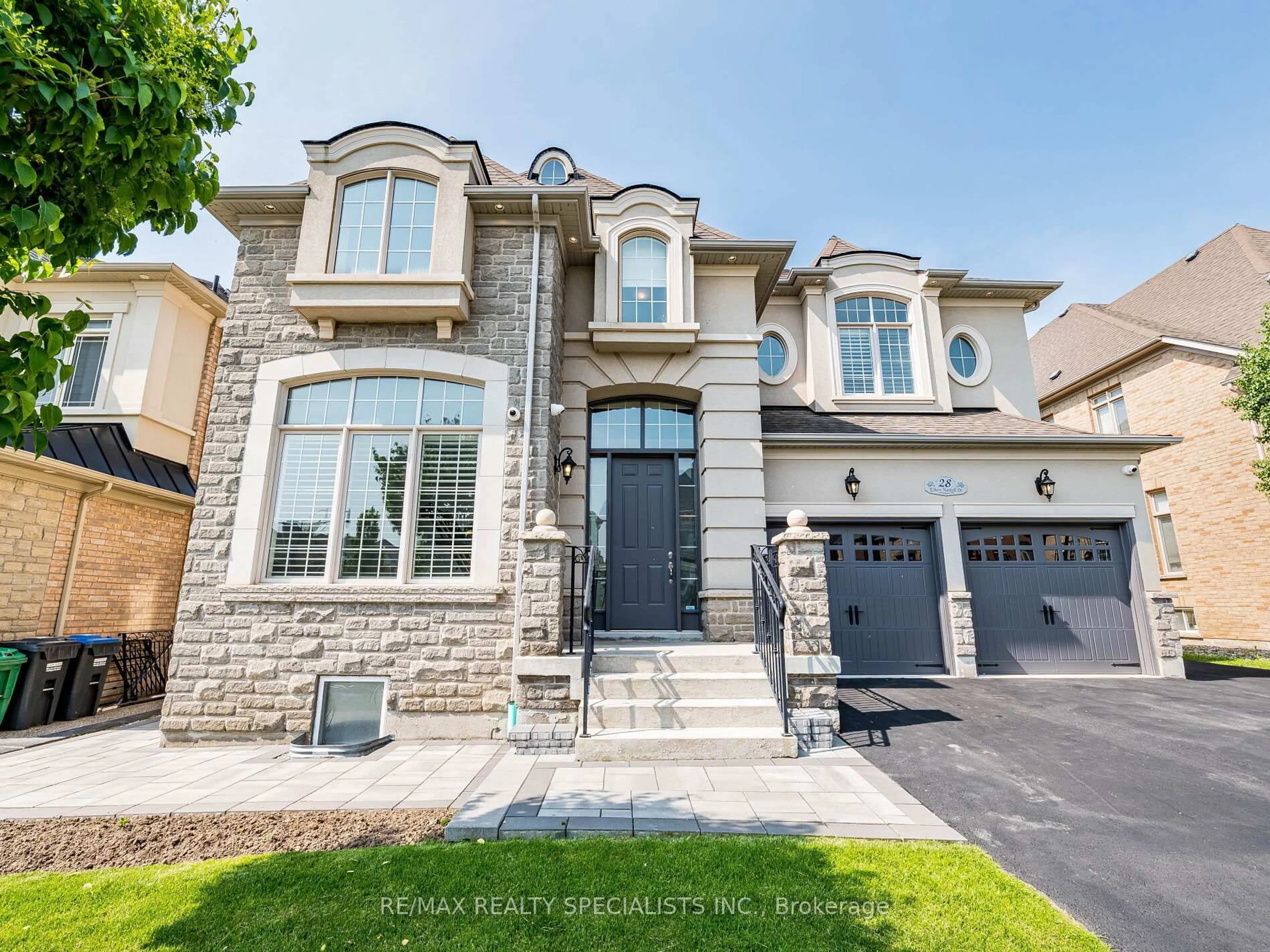 Home with brick exterior material, street for 28 Elbern Markell Dr, Brampton Ontario L6X 2X5