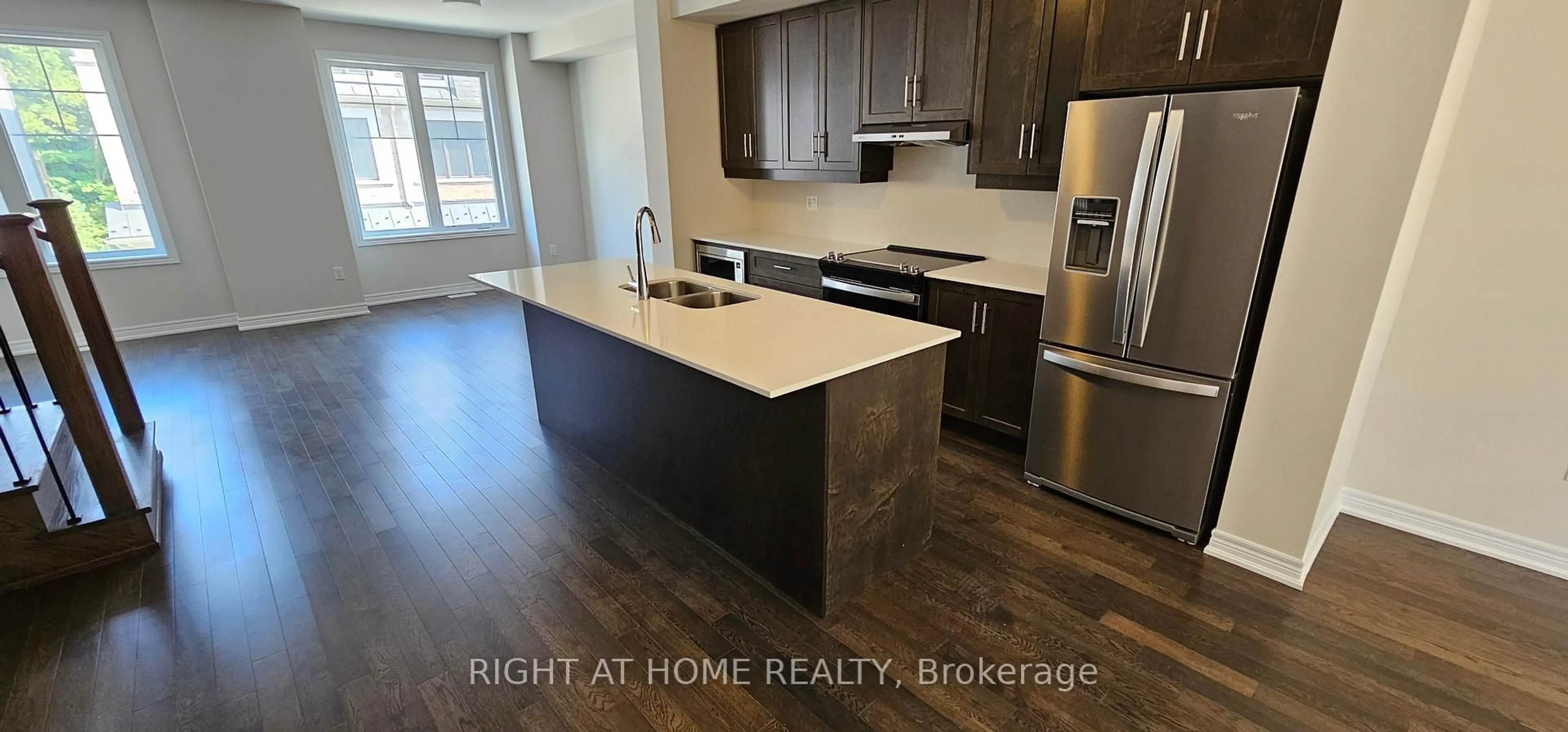 Open concept kitchen, wood/laminate floor for 34 Folcroft St, Brampton Ontario L6Y 0B6