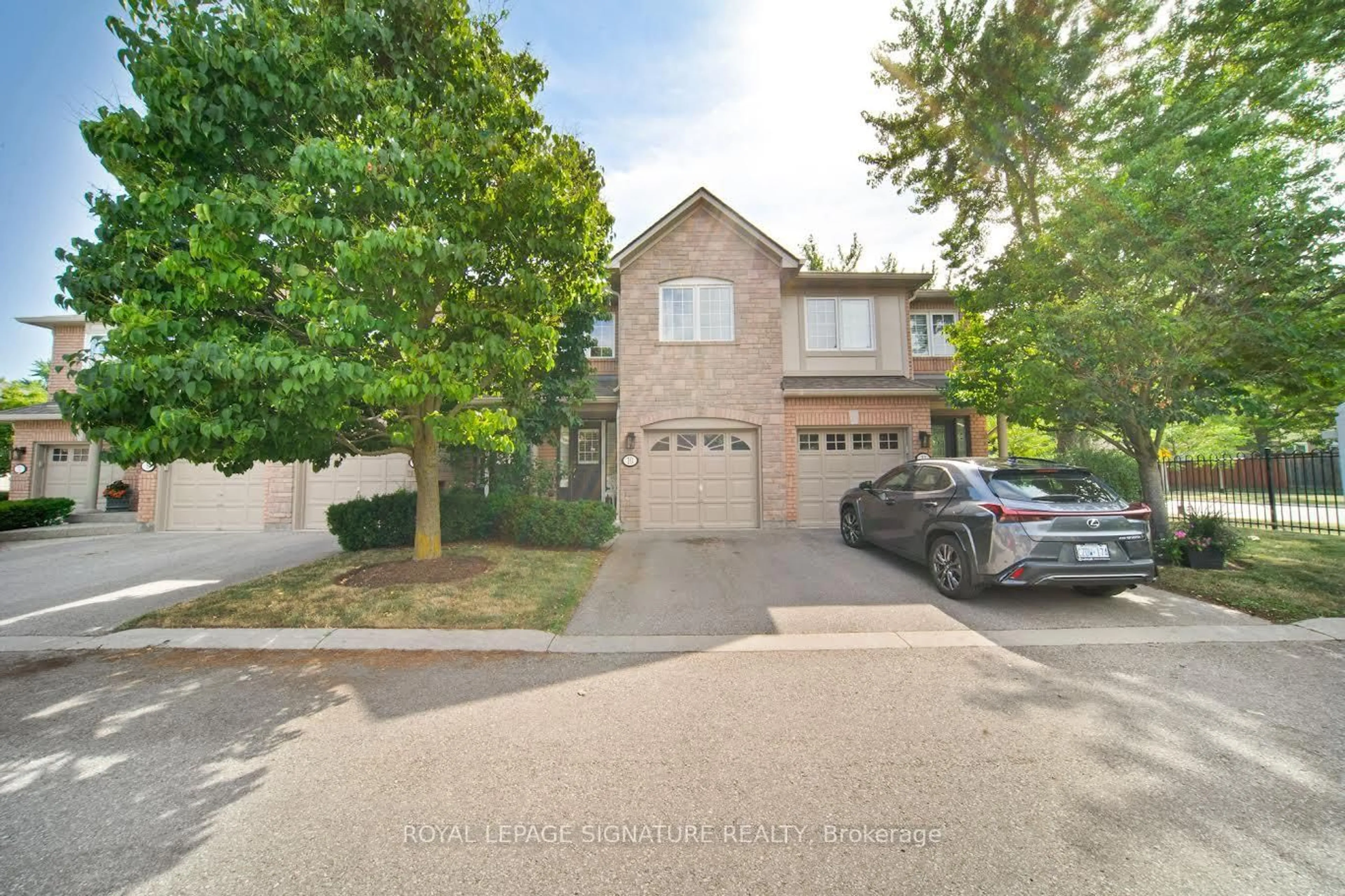 A pic from outside/outdoor area/front of a property/back of a property/a pic from drone, street for 1050 Grand Blvd #10, Oakville Ontario L6H 2S5