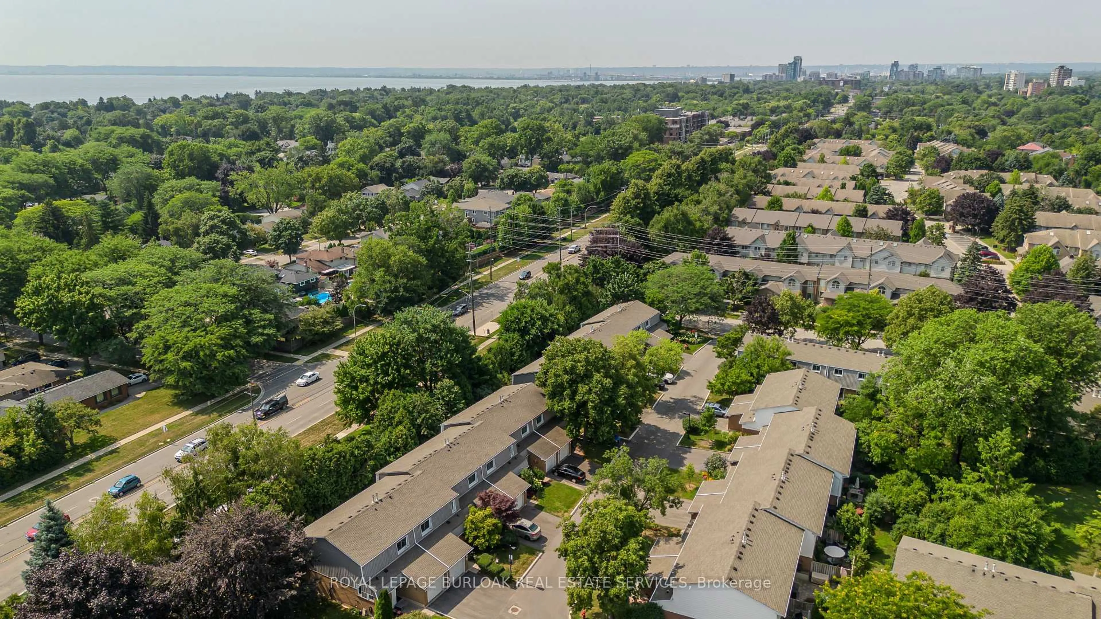 A pic from outside/outdoor area/front of a property/back of a property/a pic from drone, city buildings view from balcony for 447 Woodview Rd #3, Burlington Ontario L7N 2Z9