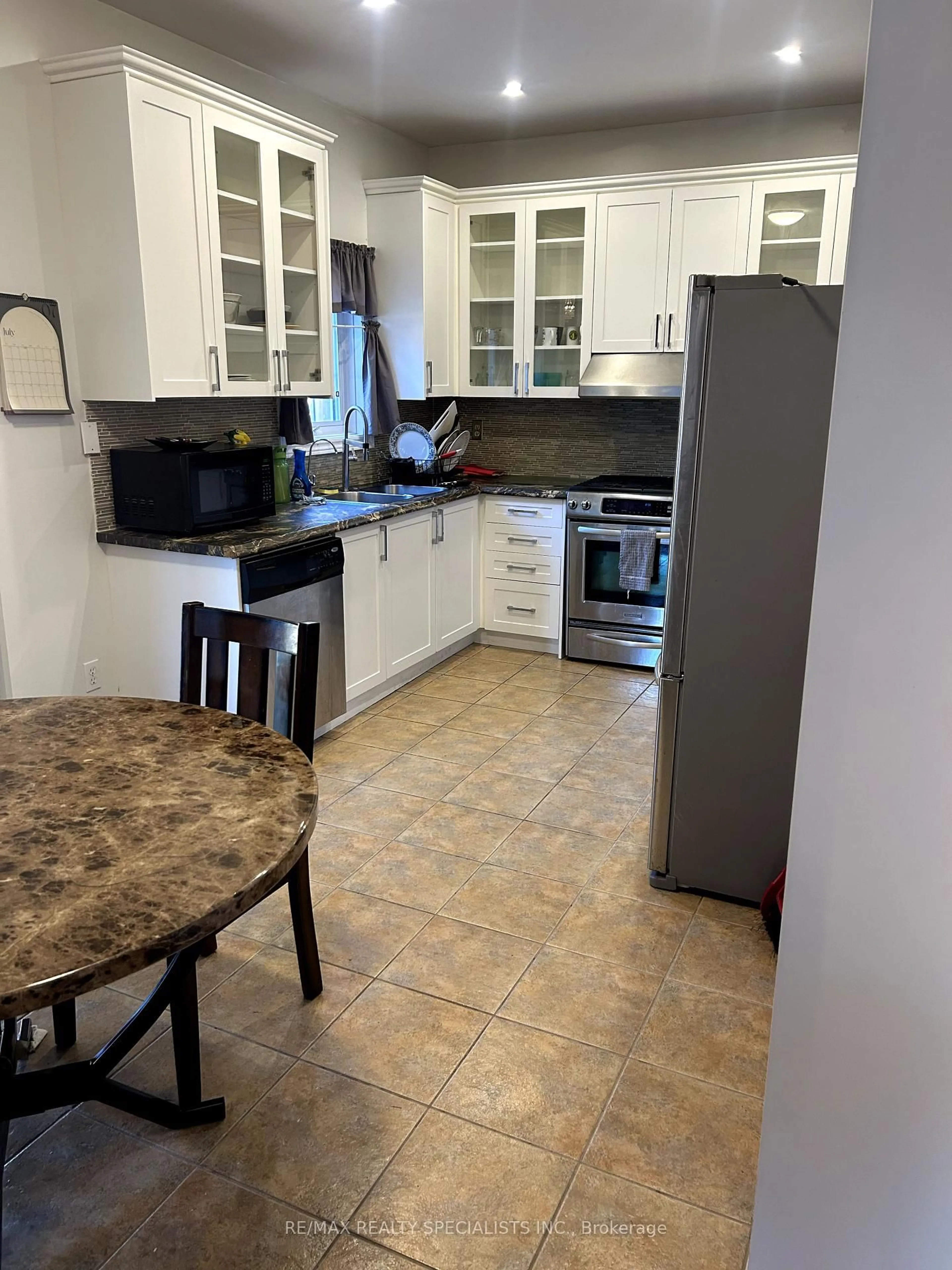 Standard kitchen, ceramic/tile floor for 64 Mossgrove Cres, Brampton Ontario L7A 3E6