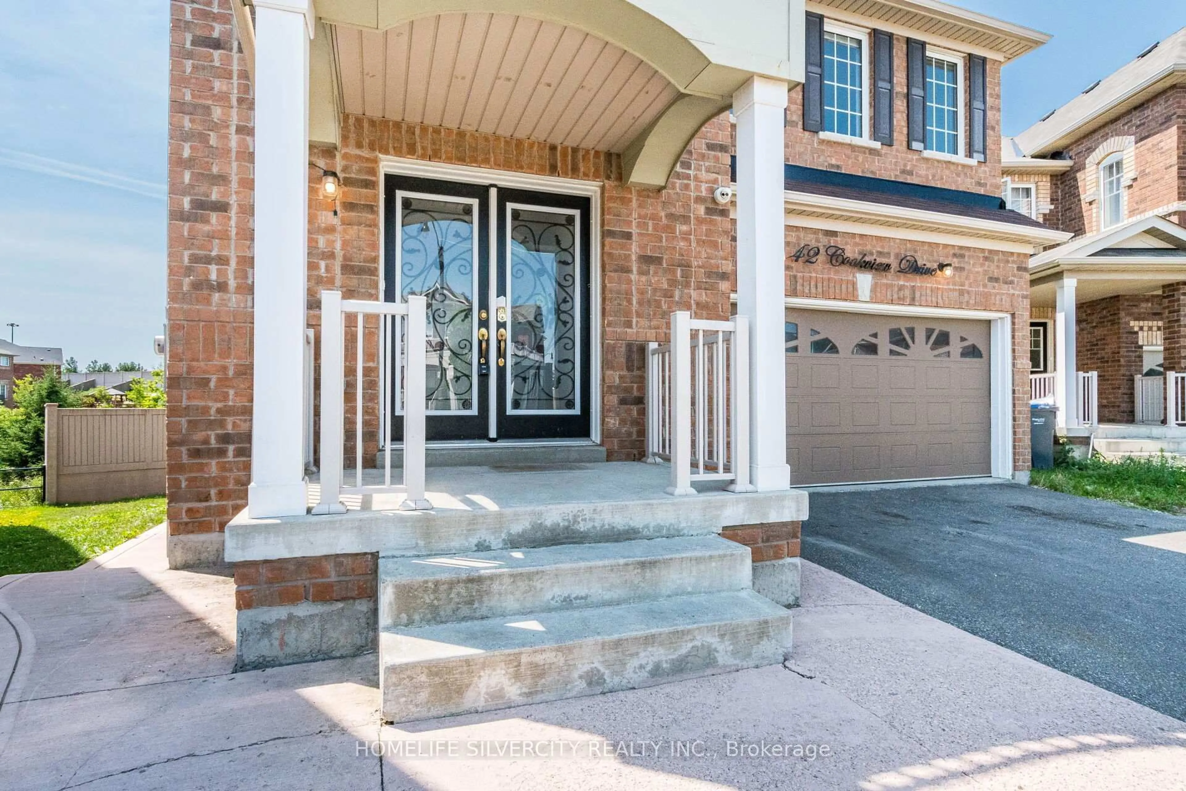 Home with brick exterior material, street for 42 Cookview Dr, Brampton Ontario L6R 3T6