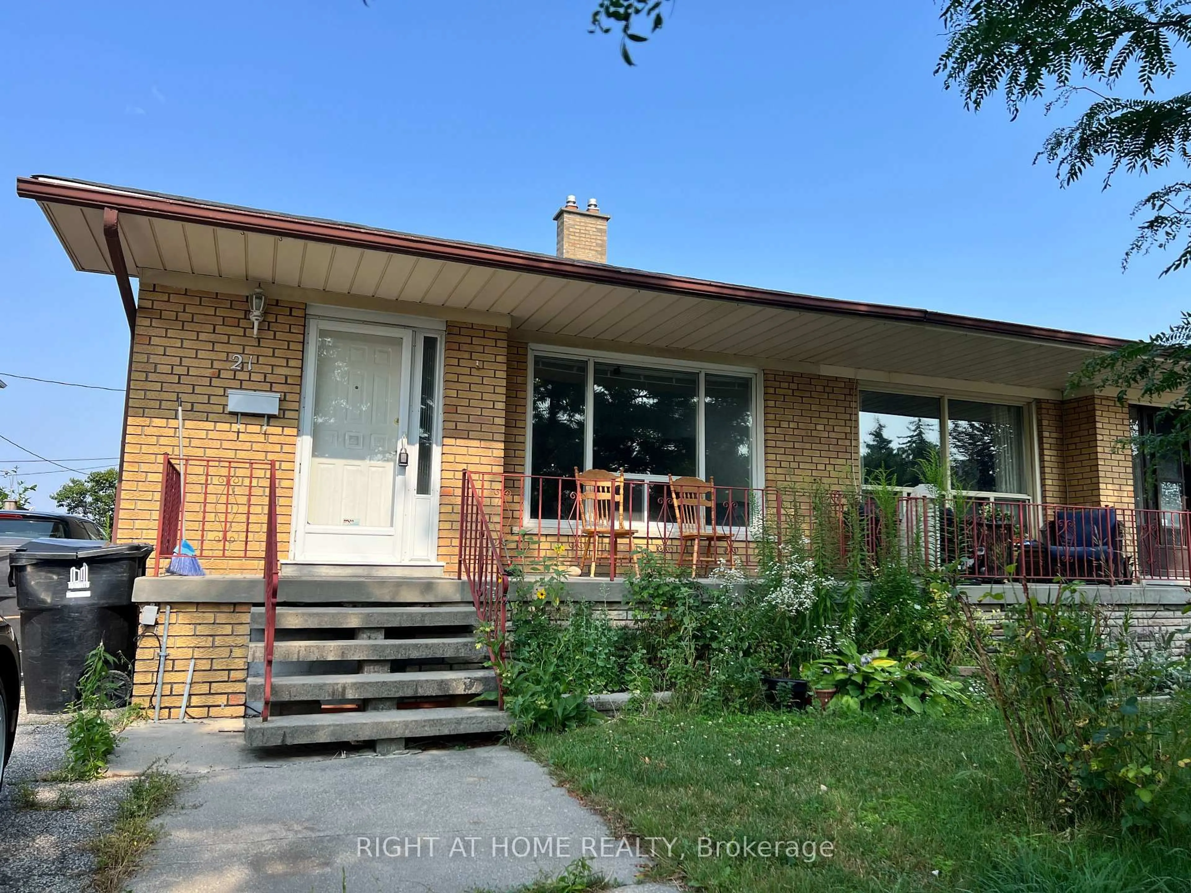 Home with brick exterior material, street for 21 Featherwood Pl, Toronto Ontario M9A 4V7