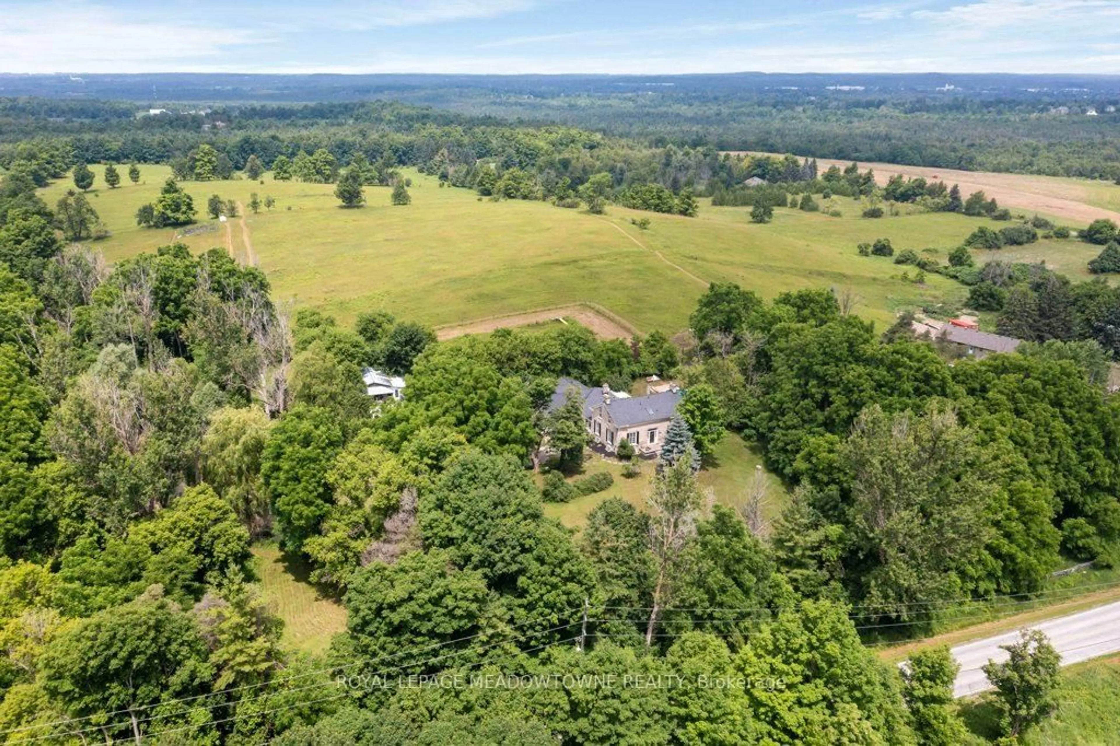 A pic from outside/outdoor area/front of a property/back of a property/a pic from drone, forest/trees view for 5595 25 Sdrd, Milton Ontario L7J 2L7