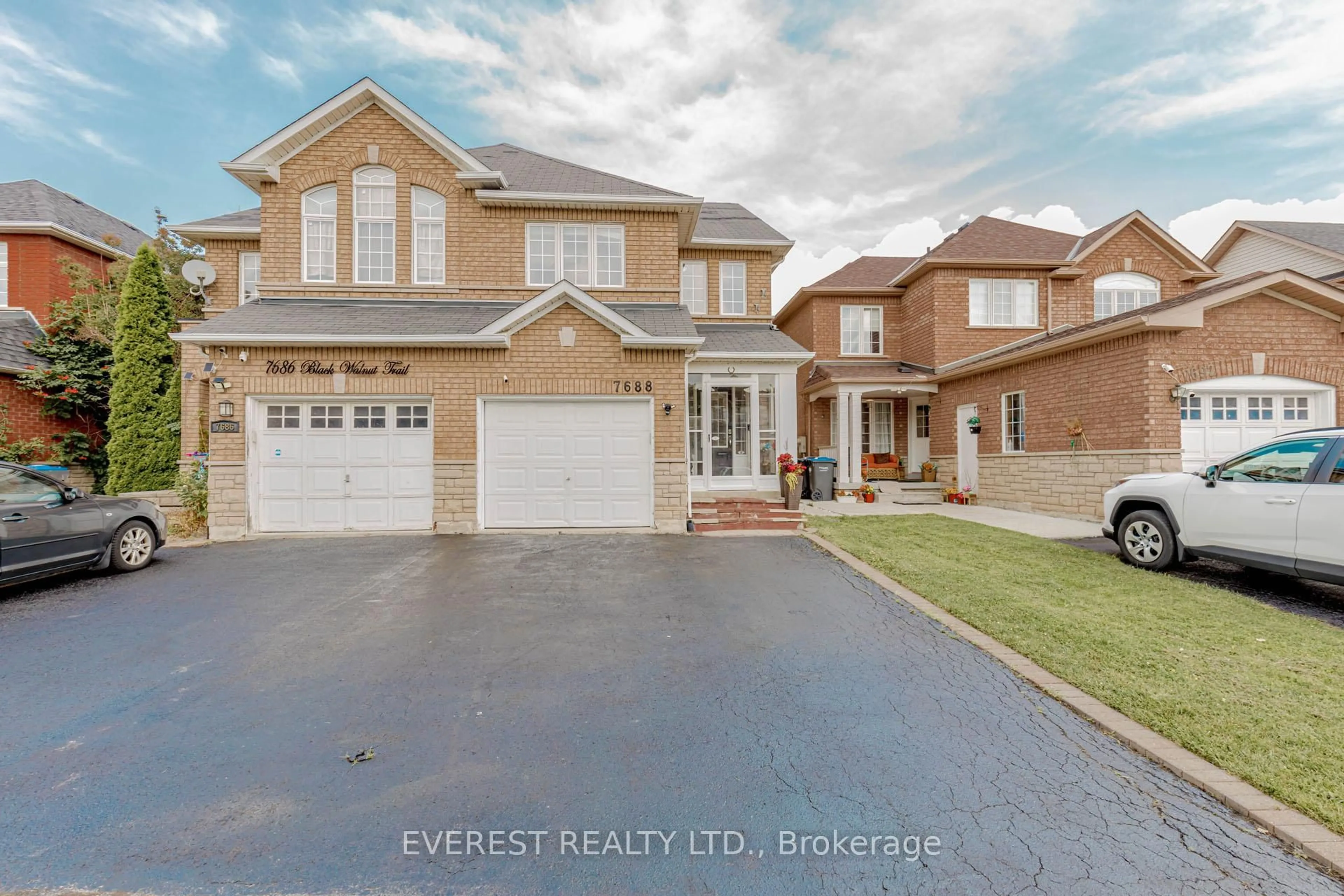Home with brick exterior material, street for 7688 Black Walnut Tr, Mississauga Ontario L5N 8A6