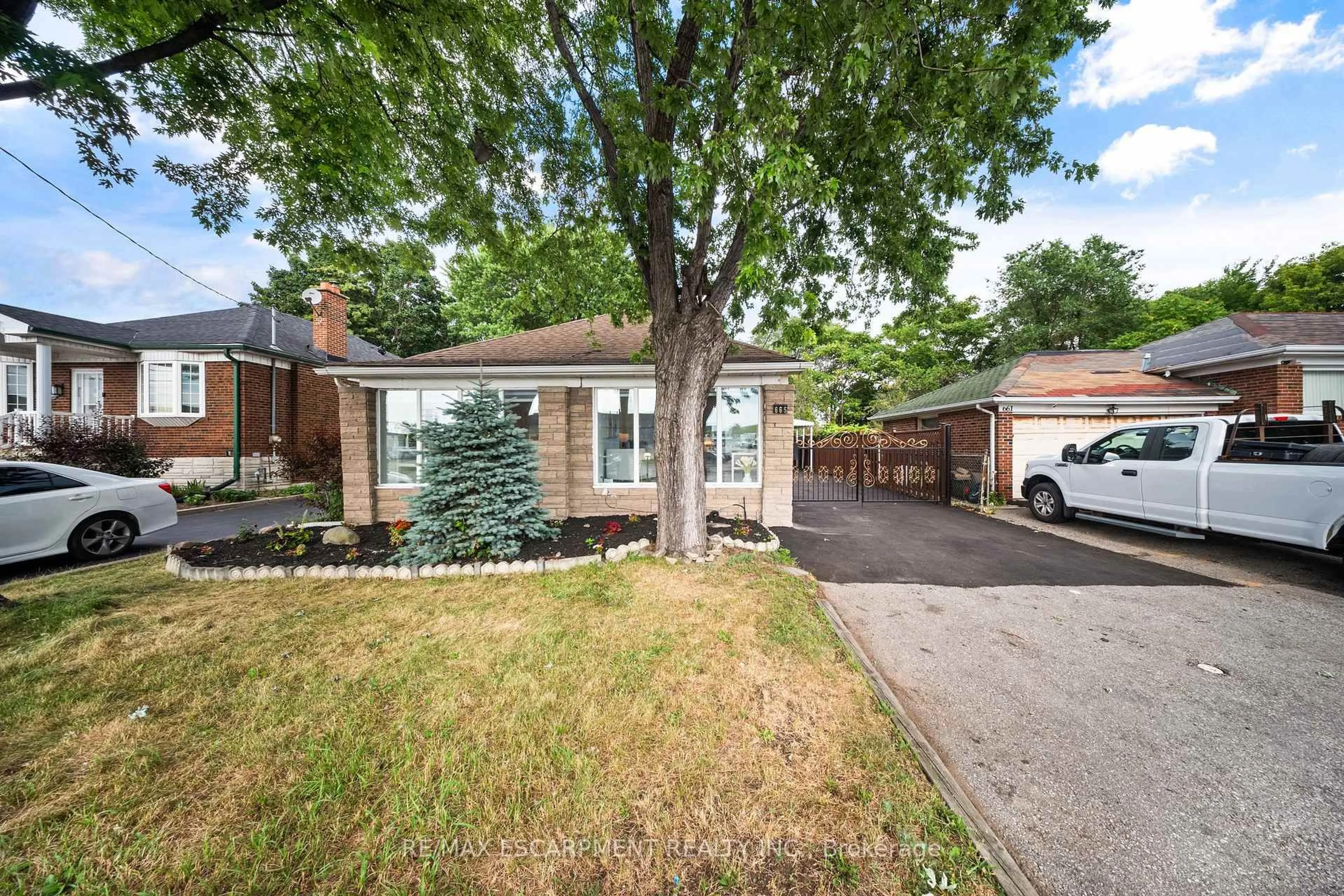 Home with brick exterior material, street for 665 Kipling Ave, Toronto Ontario M8Z 5G2